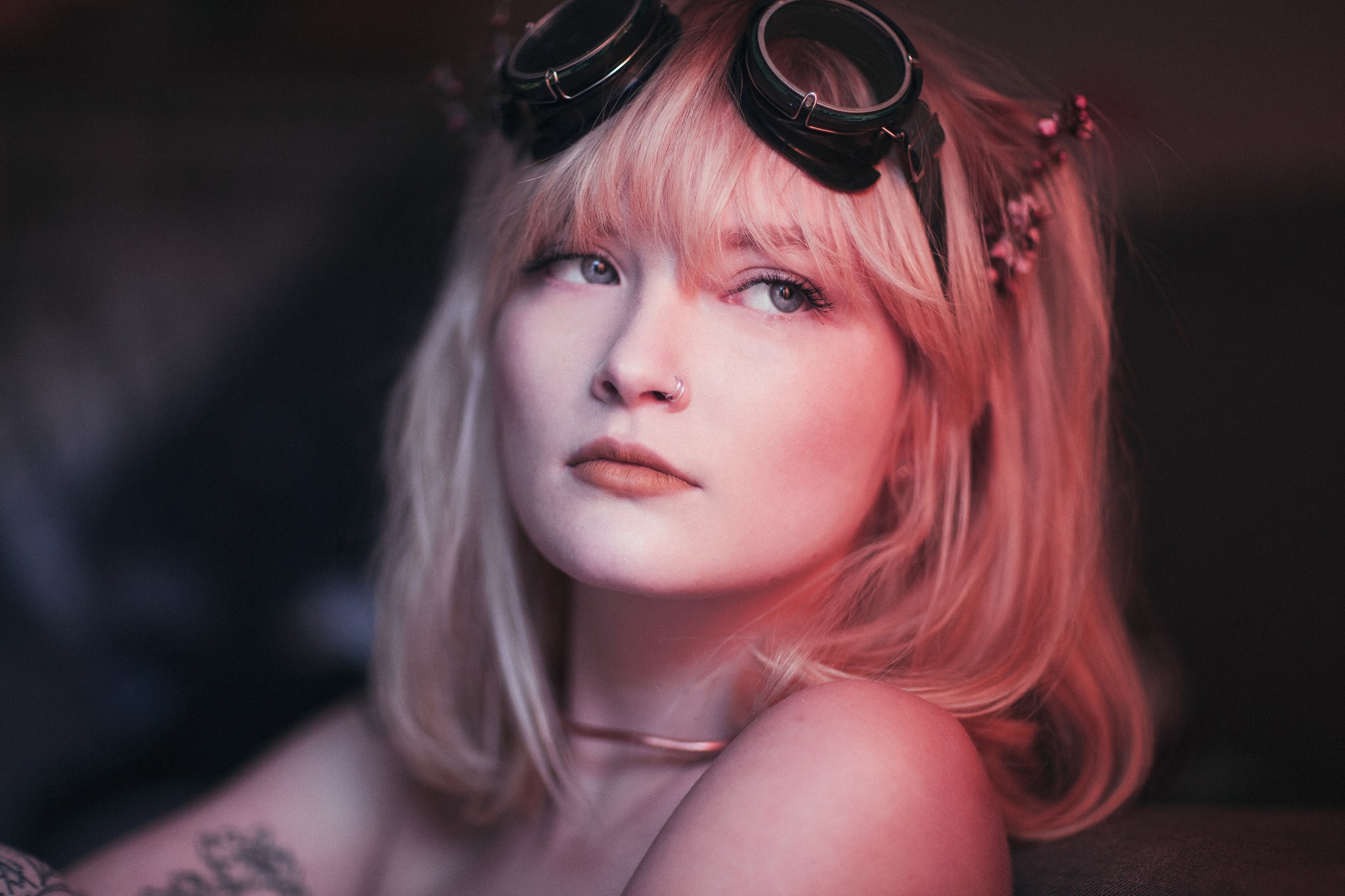 People 2048x1365 women Ruby James blonde nose ring tattoo looking away bare shoulders goggles steampunk blue eyes closeup