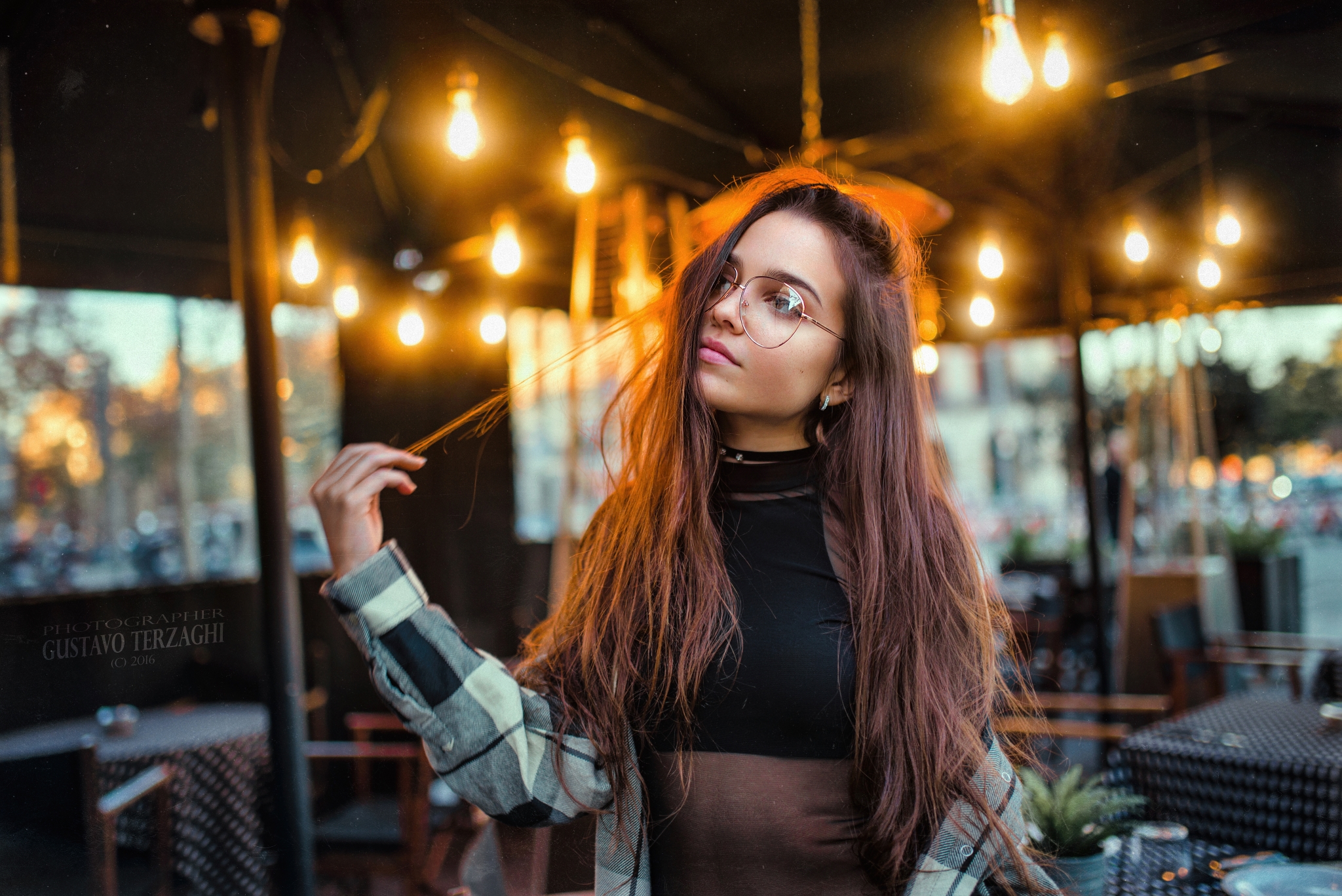 People 2048x1367 women model brunette long hair touching hair women with glasses looking away necklace black top plaid shirt depth of field restaurant light bulb indoors women indoors portrait photography Gustavo Terzaghi