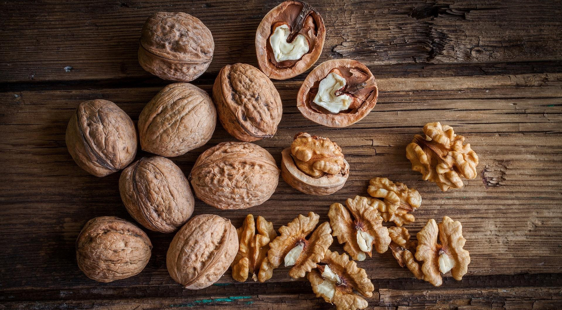 General 1919x1059 food nuts wooden surface walnuts fruit still life closeup
