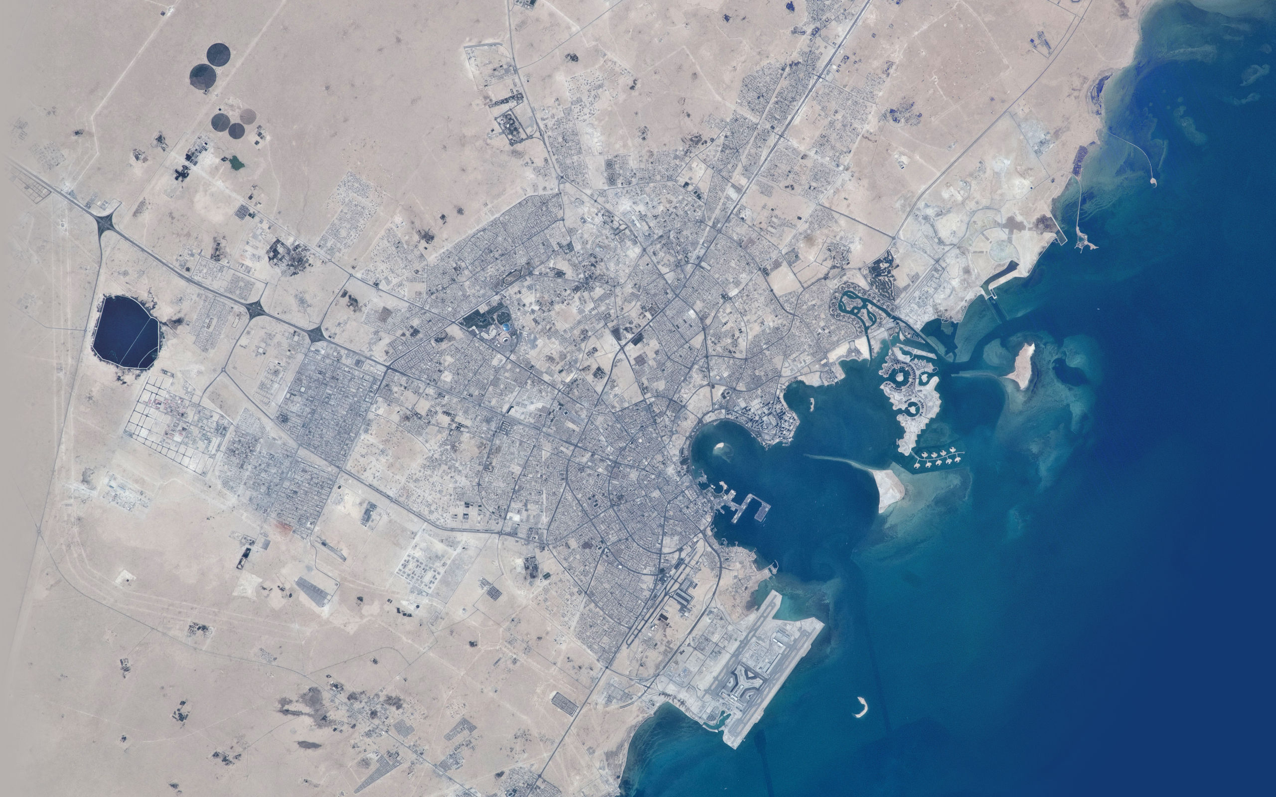General 2560x1600 satellite photo aerial view coastline cityscape sea gray infrastructure blue