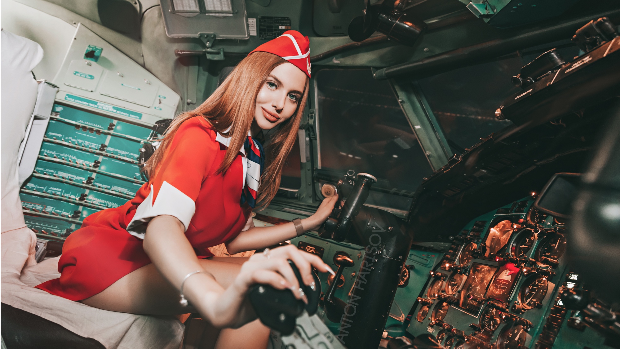 People 2000x1125 women planes brunette Anton Harisov portrait sitting smiling red dress stewardess cockpit red red lipstick women with hats vehicle women with planes long hair makeup costumes dyed hair aircraft watermarked