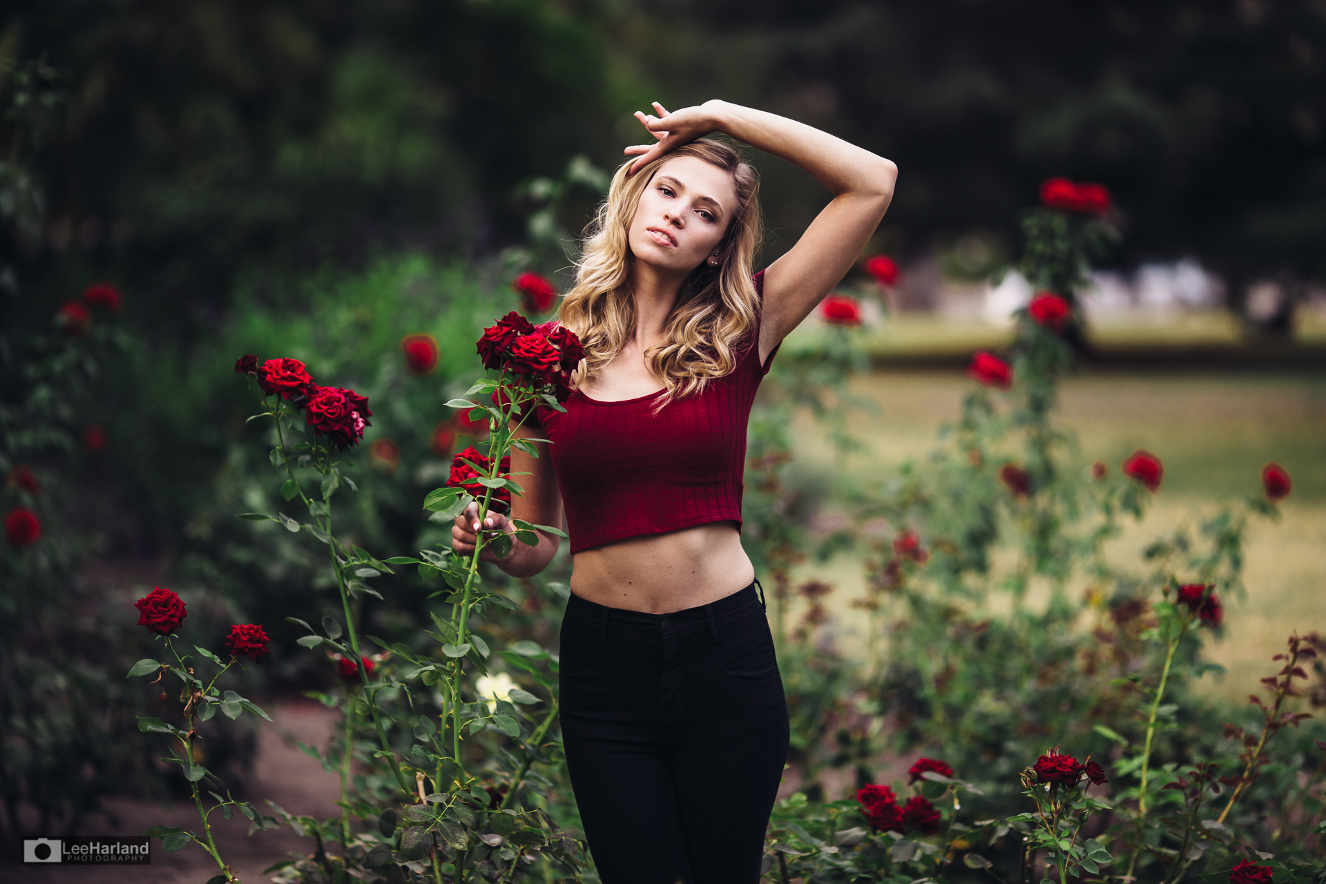 People 1920x1280 women portrait model blonde blue eyes open mouth arms up curly hair red tops belly flowers Lee Harland watermarked