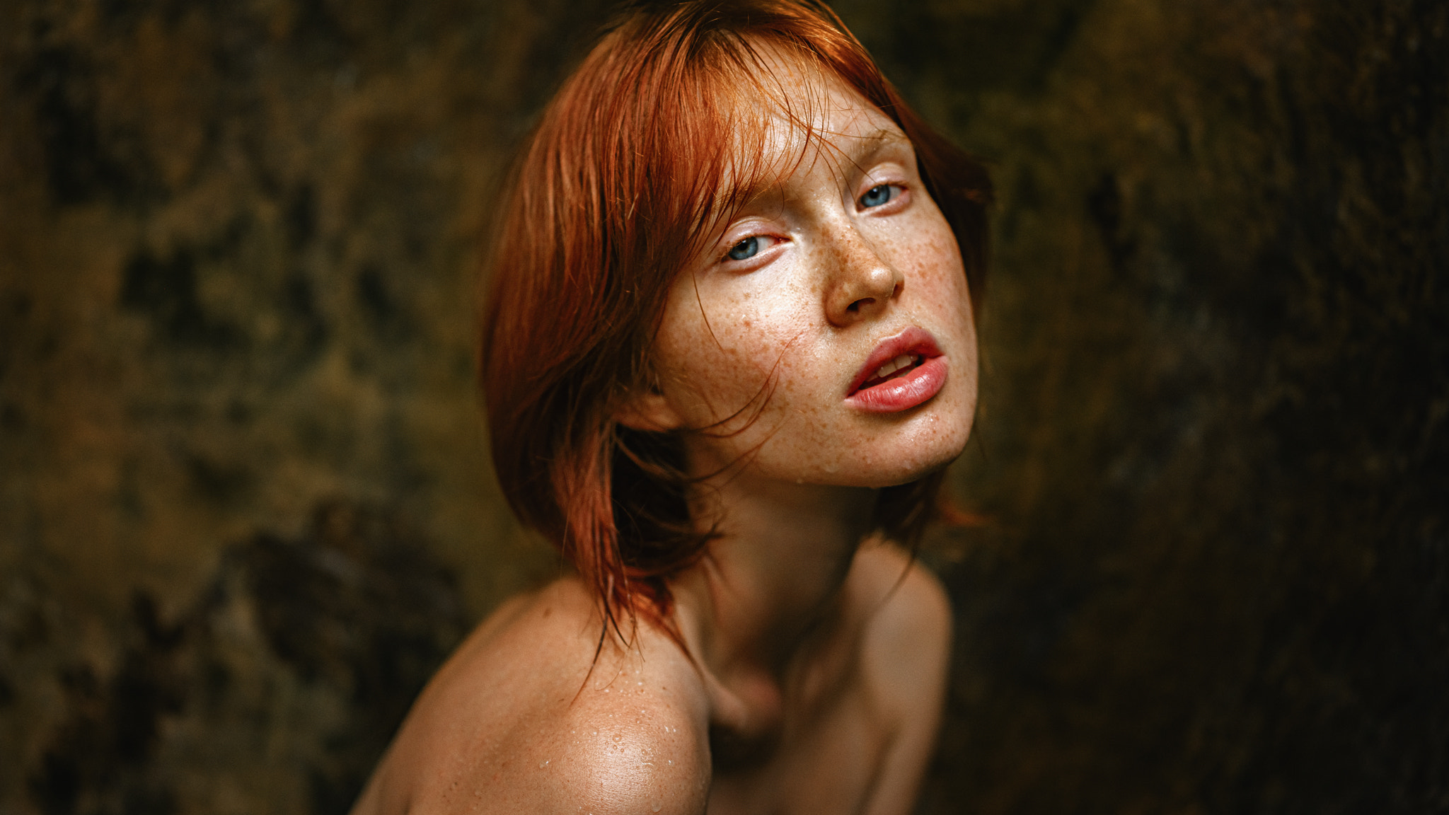 People 2048x1152 Georgy Chernyadyev women Arina Bikbulatova redhead freckles wet bare shoulders blue eyes simple background portrait implied nude
