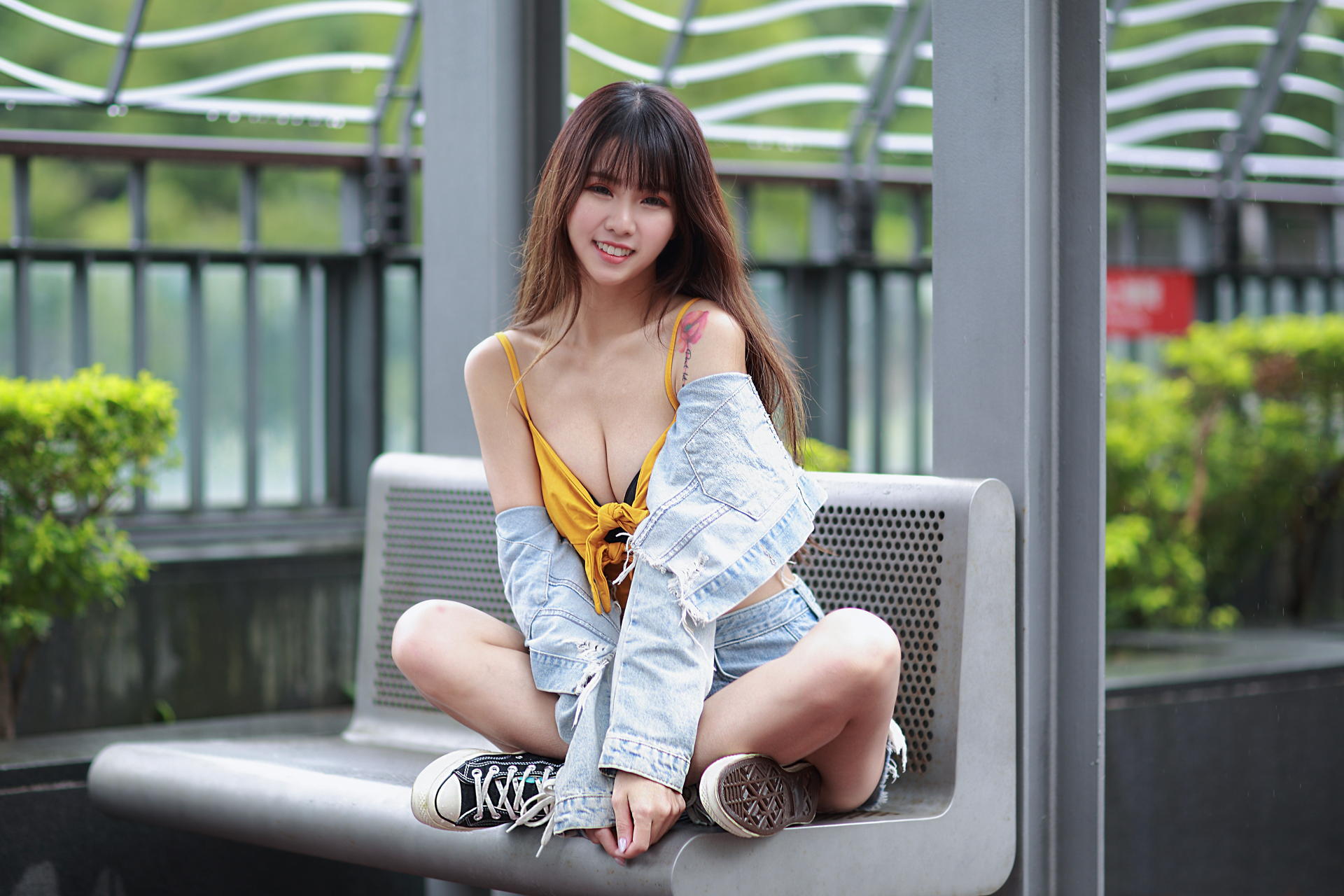 People 1920x1280 Asian model women long hair brunette sitting sneakers shorts yellow tops cleavage bench