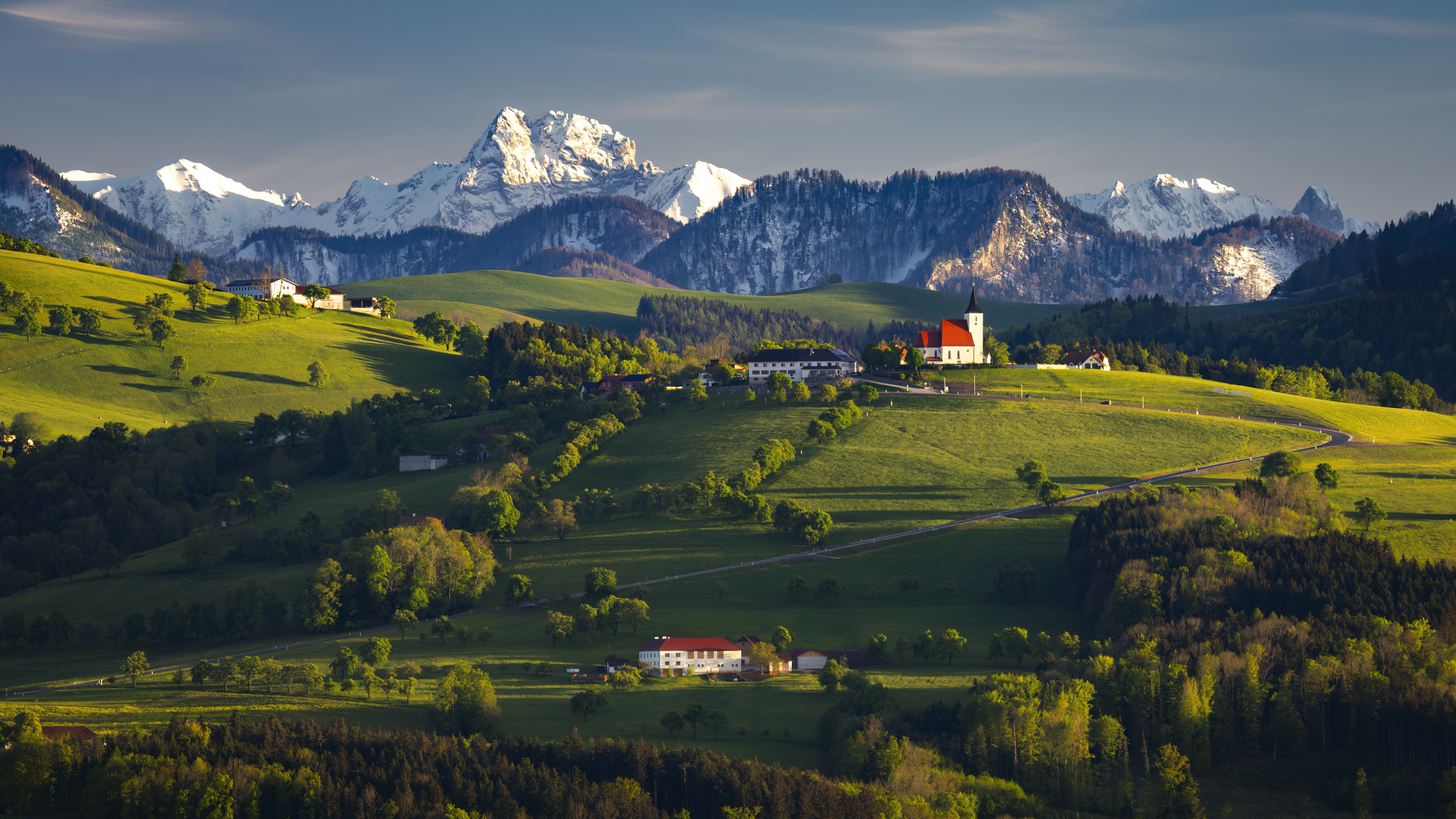 General 5000x2813 nature landscape clouds sky trees mountains snowy peak snow grass field house building village sunlight hills