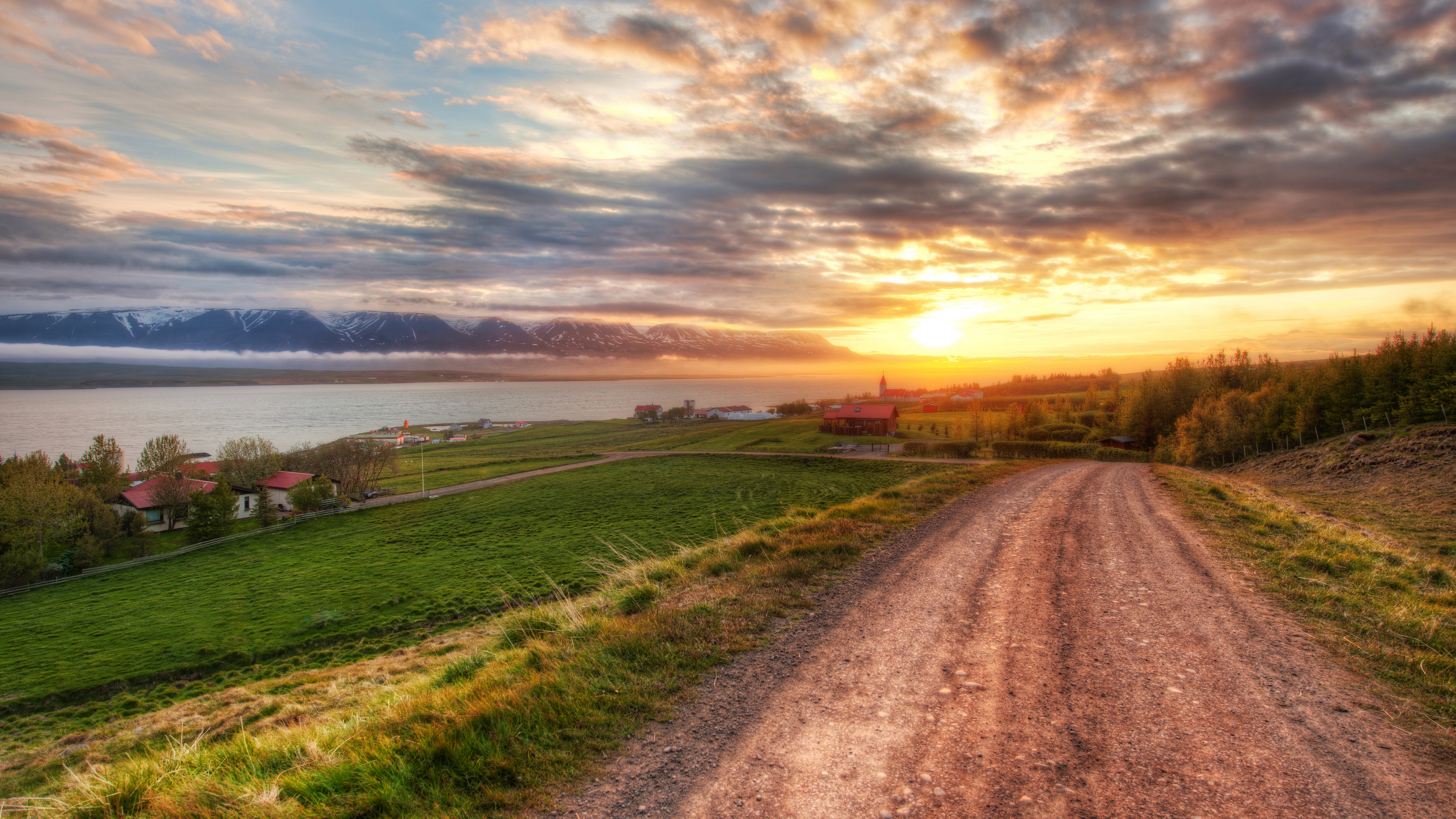 General 3840x2160 landscape Iceland Trey Ratcliff photography nature mountain chain water field village road trees clouds sunset sunset glow sky HDR