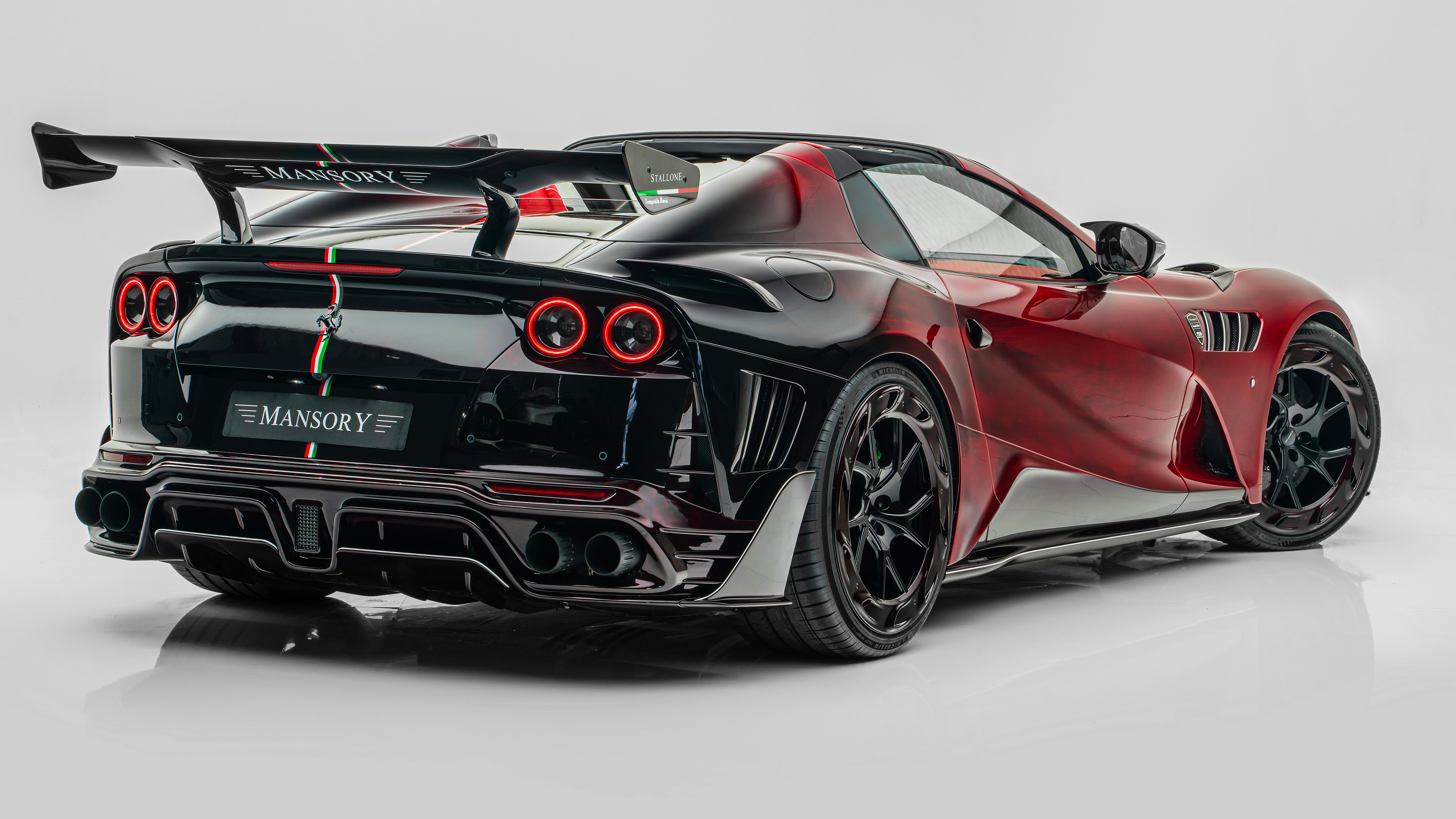 General 3840x2160 Mansory Ferrari sports car vehicle tuning bodykit simple background car white background rear view licence plates taillights italian cars Stellantis car spoiler rear wing