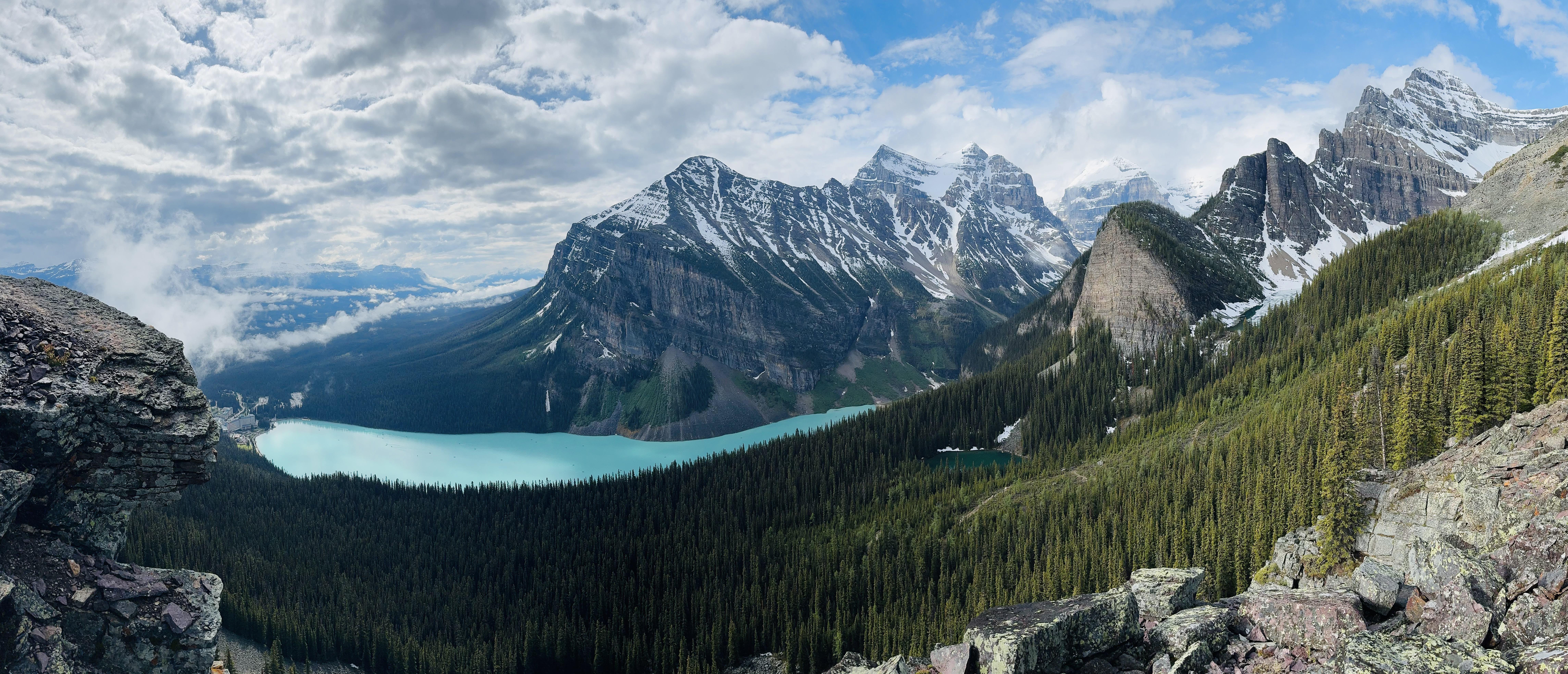 General 9156x3934 landscape nature lake forest rocks cliff snow clouds mountains Canada Alberta North America