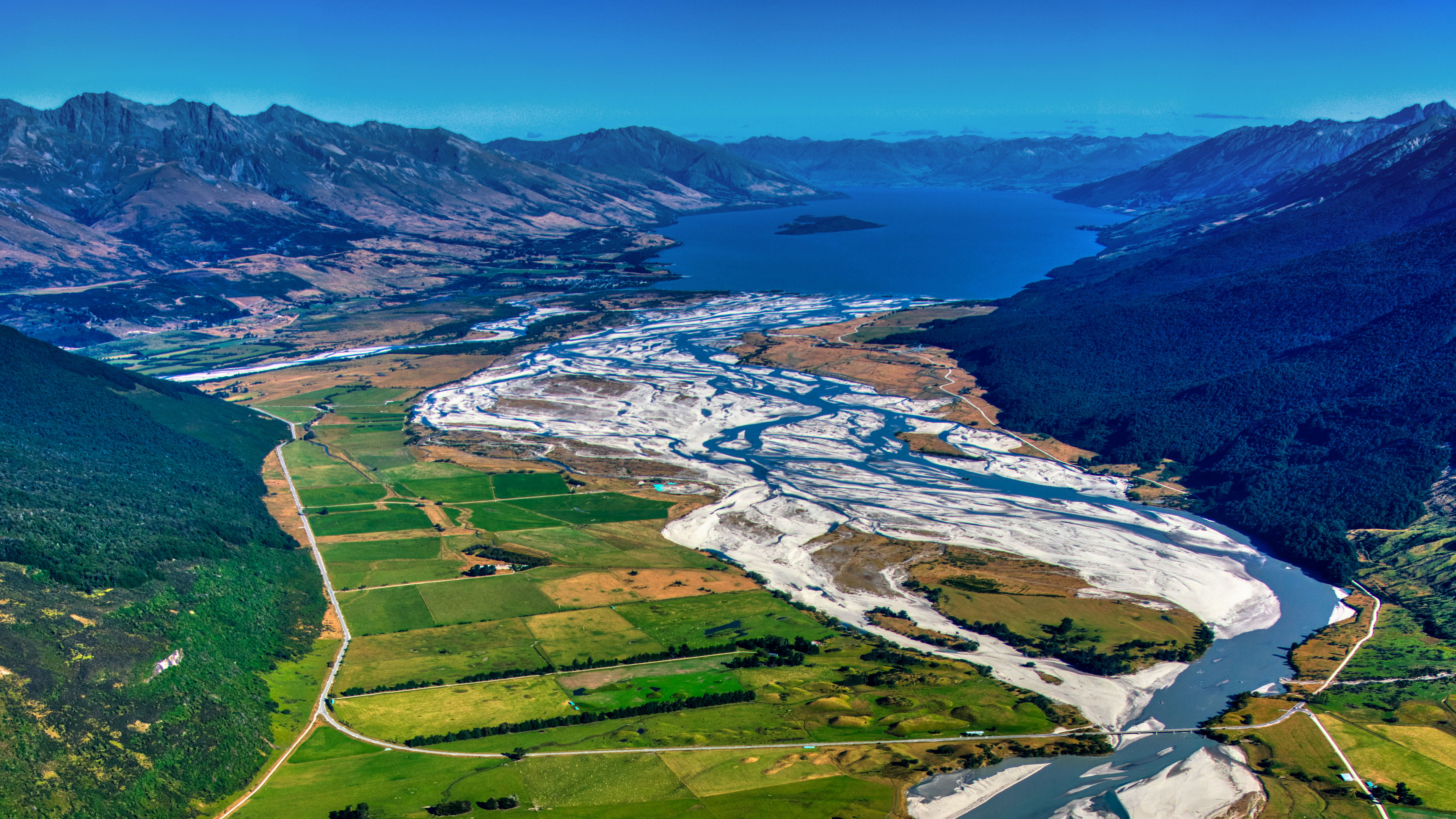 General 3840x2160 photography Trey Ratcliff landscape New Zealand aerial view field water mountains sky mountain chain panorama road valley Queenstown region 4K