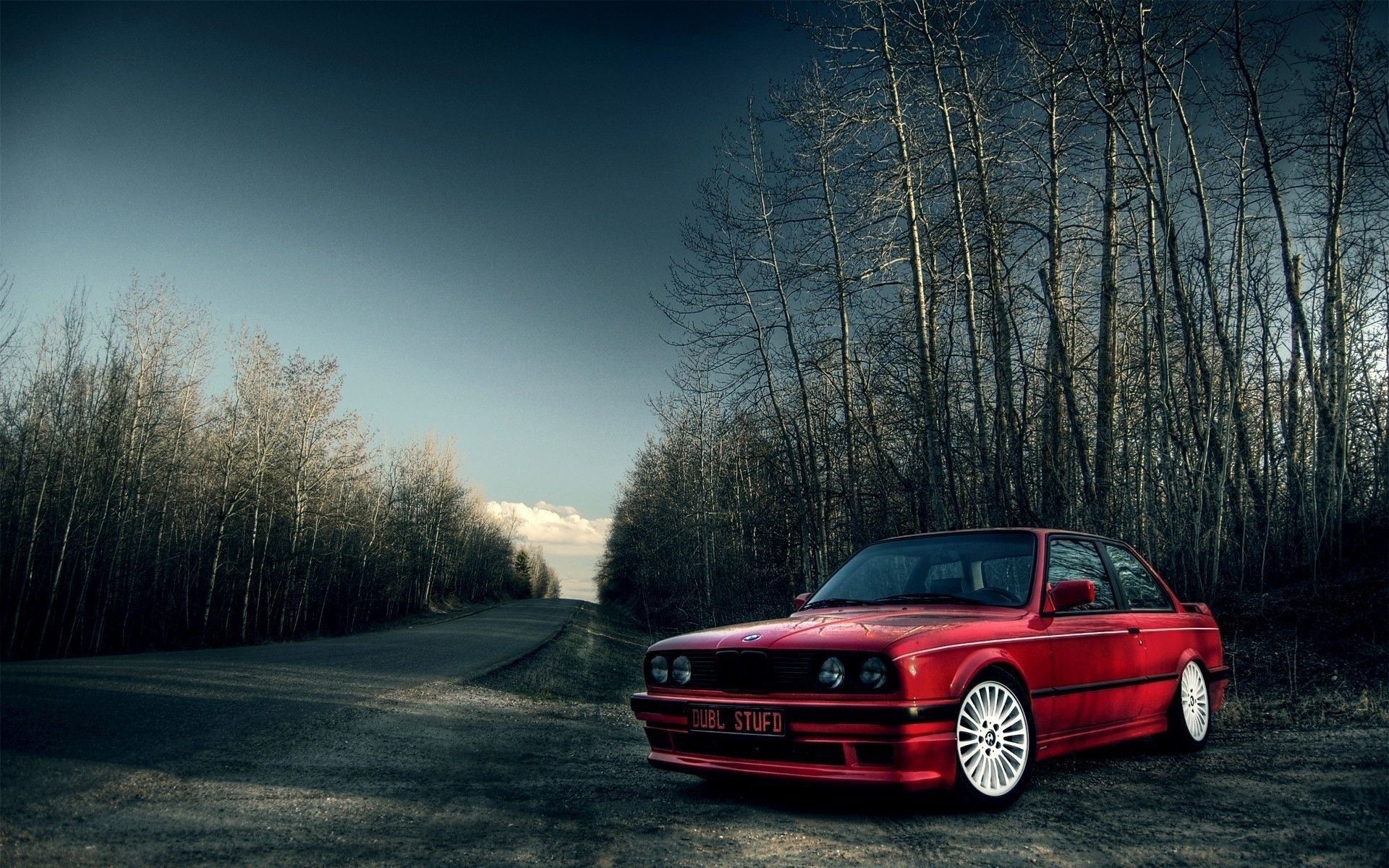General 1920x1200 red trees white BMW E30 BMW German cars vehicle frontal view licence plates ass dead trees road
