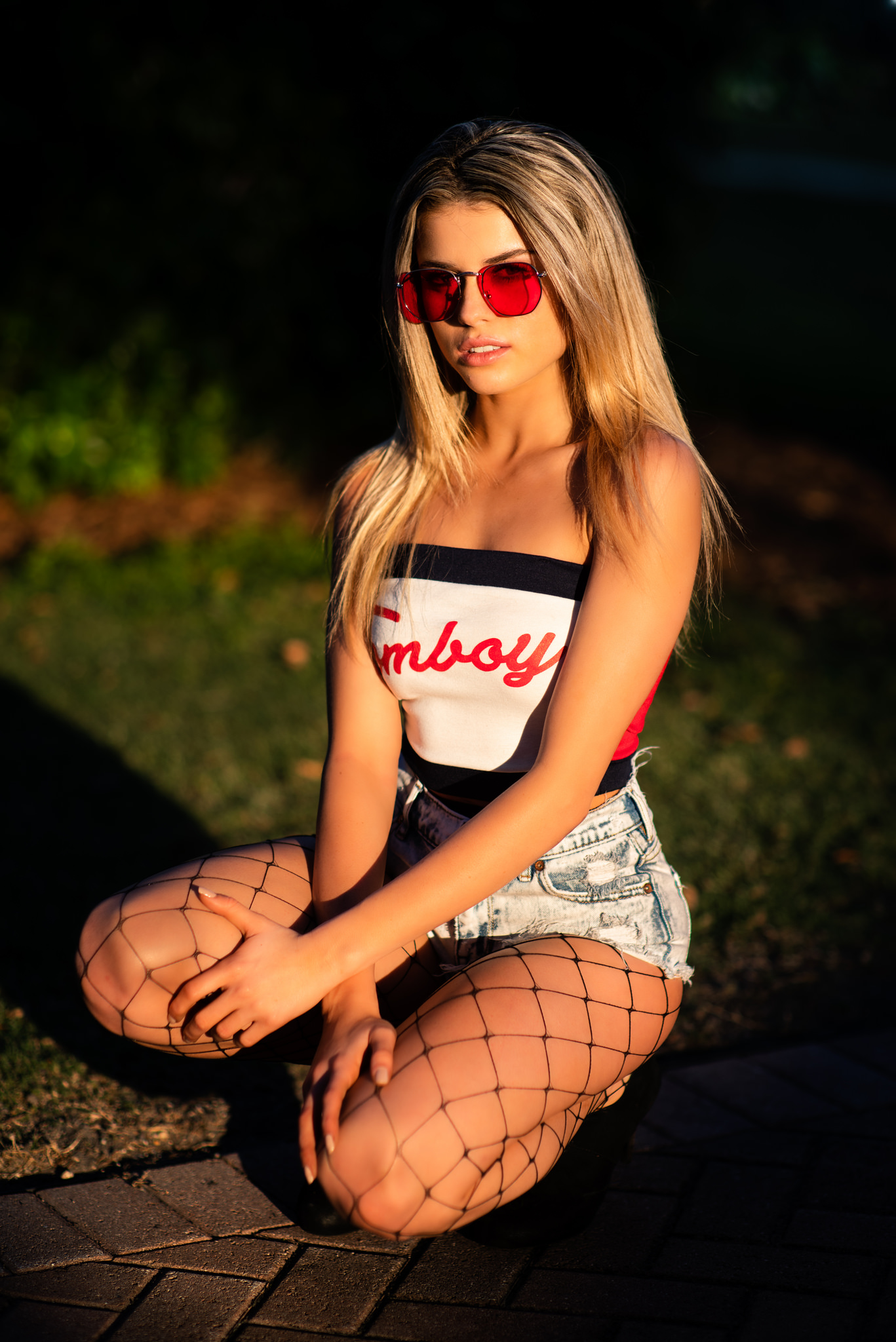 People 1367x2048 Cassidy Coliskey women blonde model looking at viewer sunglasses depth of field crop top bare shoulders jean shorts high waisted shorts fishnet pantyhose squatting portrait display outdoors women outdoors Christopher Rankin