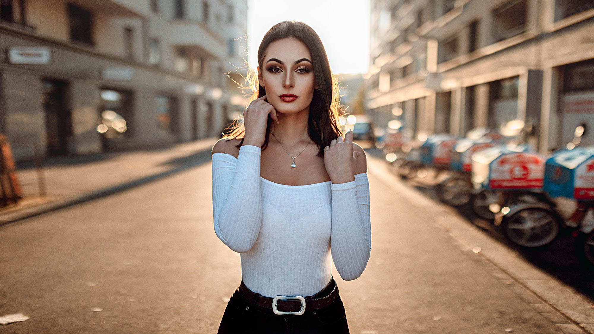 People 2000x1125 women belt women outdoors portrait red lipstick necklace bare shoulders face brunette street looking at viewer tight clothing sunlight bokeh retouching