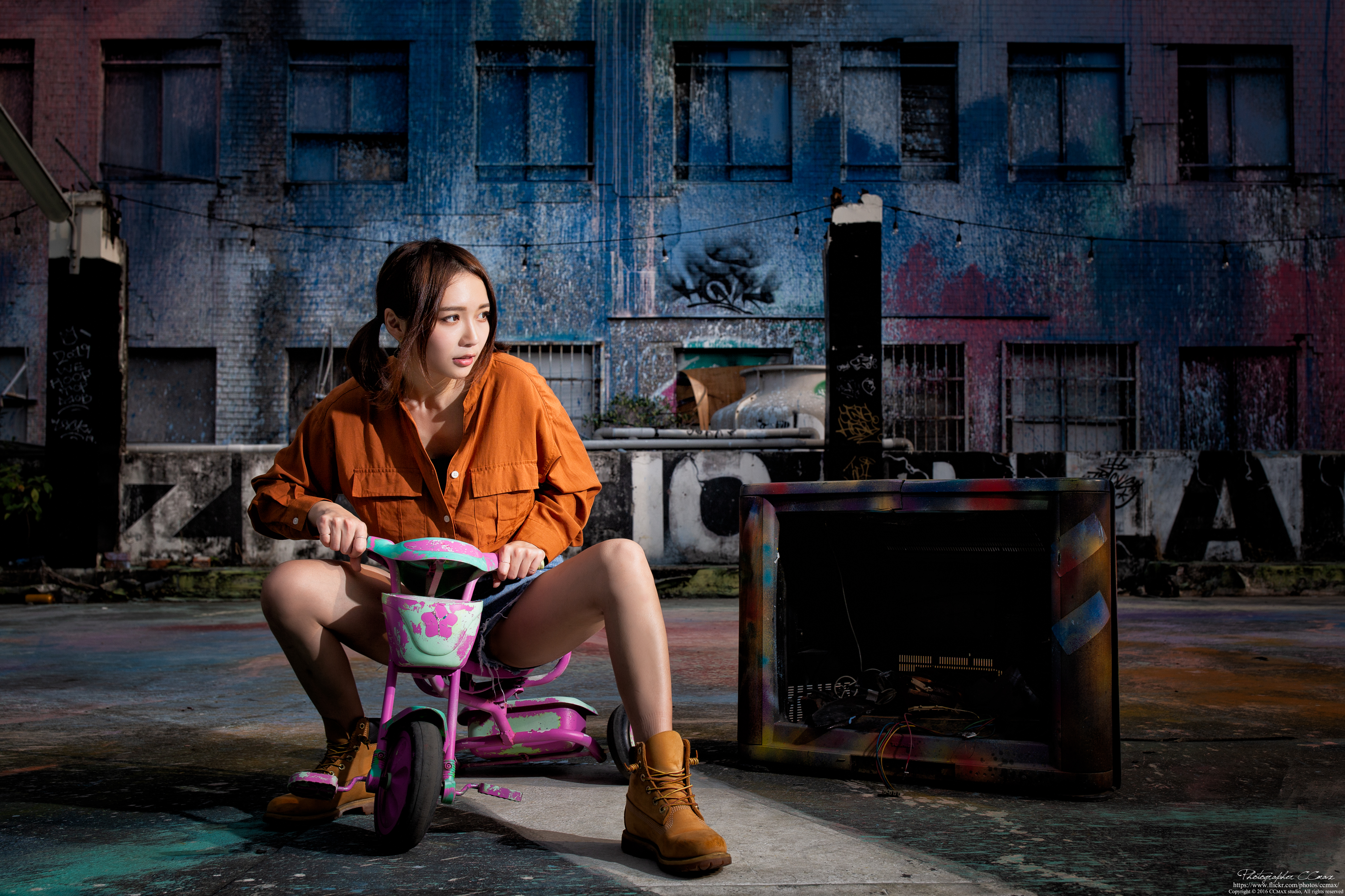 People 5159x3439 Asian model women long hair brunette sitting twintails tricycle shorts shirt boots