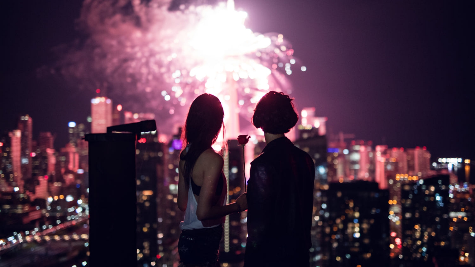 General 1599x900 people cityscape night women couple city lights fireworks