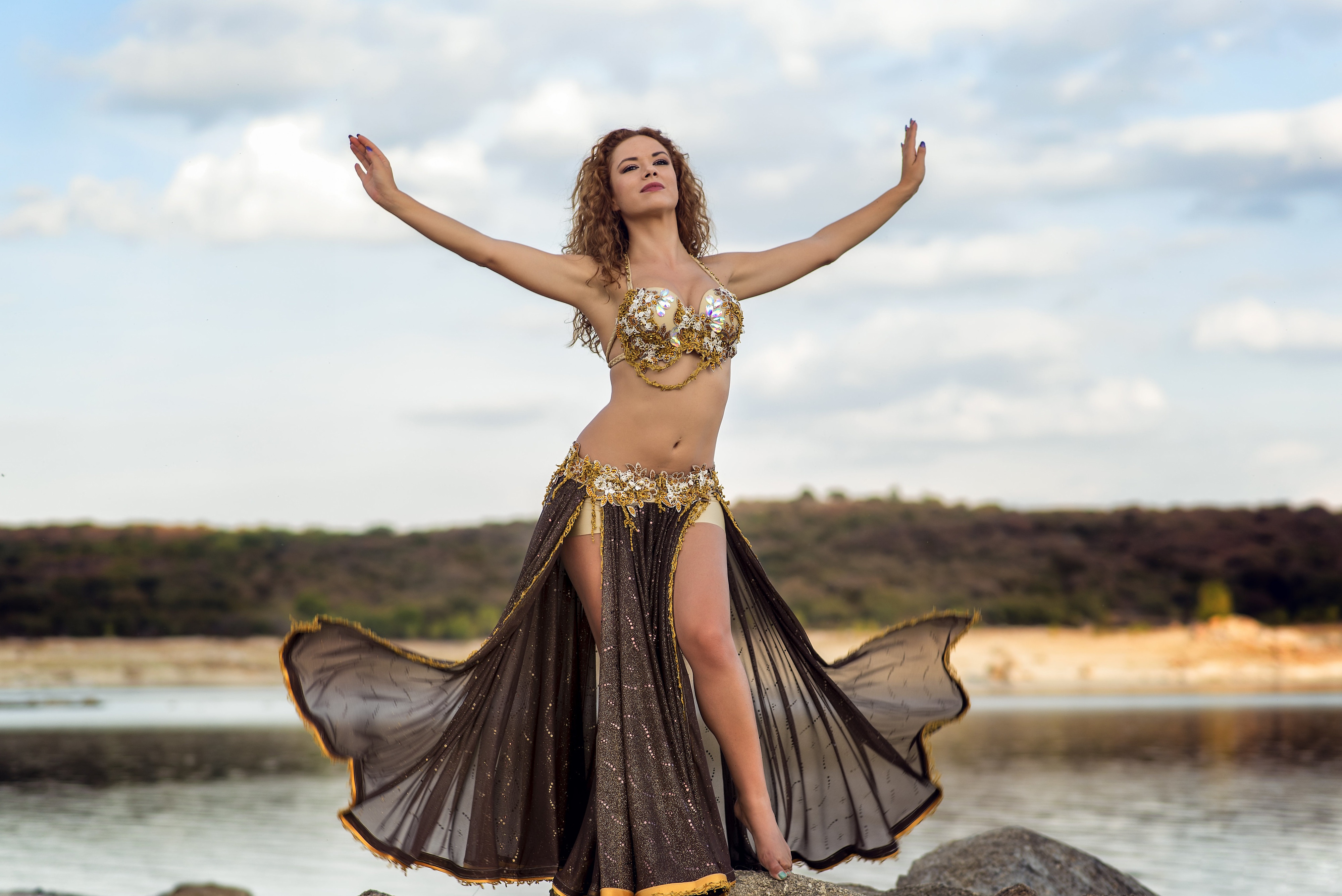 People 4000x2671 women arms up dancer women outdoors curly hair Belly Dancer
