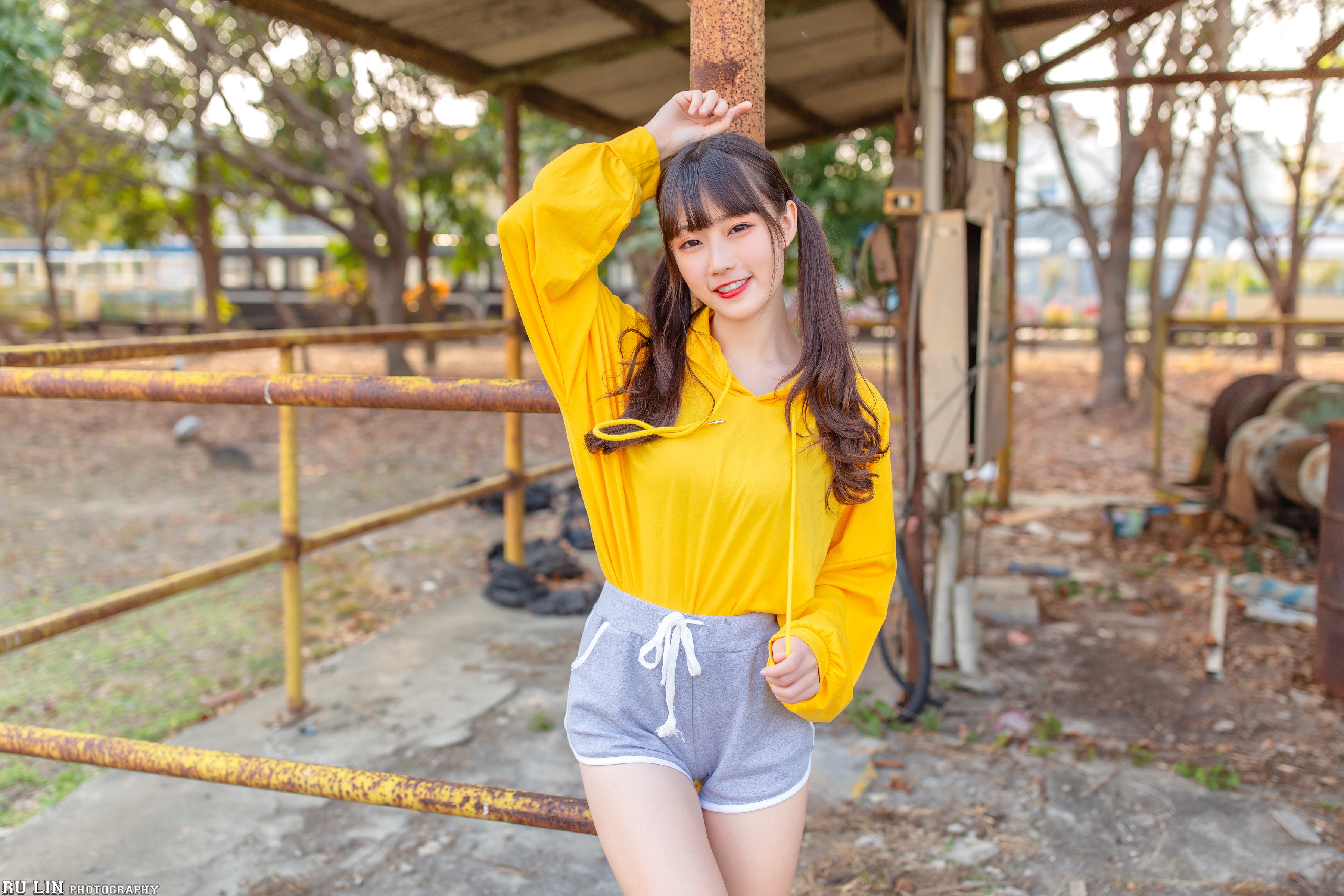 People 3600x2400 women model brunette Asian looking at viewer hoods sweatshirts short shorts portrait red lipstick smiling frontal view depth of field outdoors women outdoors twintails Angela Wei Ting