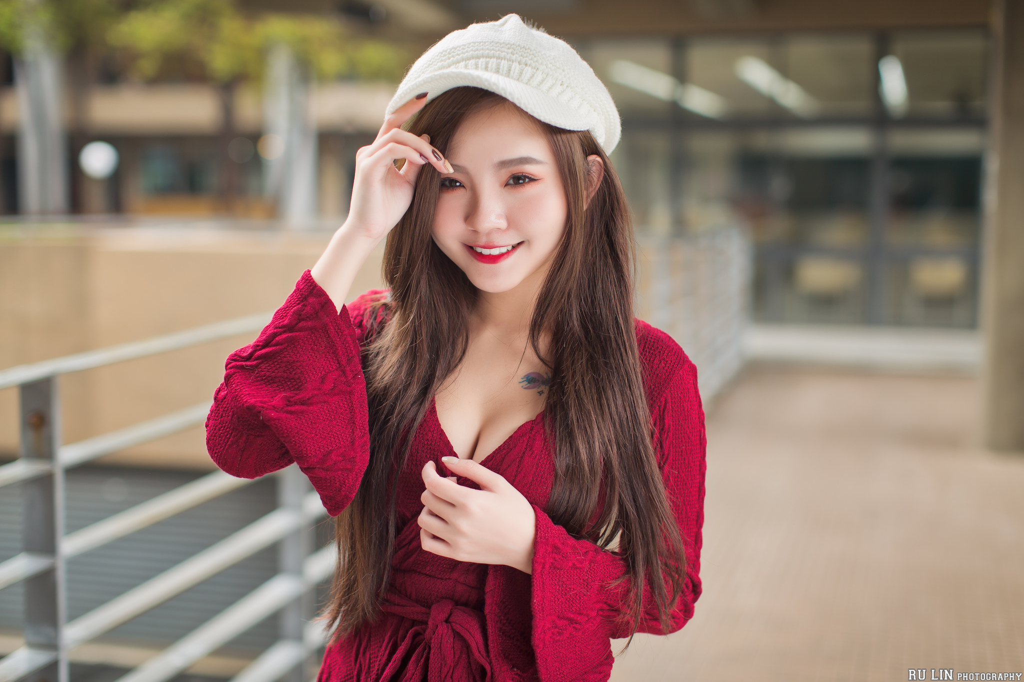 People 2048x1365 women model Asian brunette long hair looking at viewer red lipstick smiling painted nails knit hat knit fabric berets cleavage dress red dress tattoo portrait depth of field outdoors women outdoors Albee