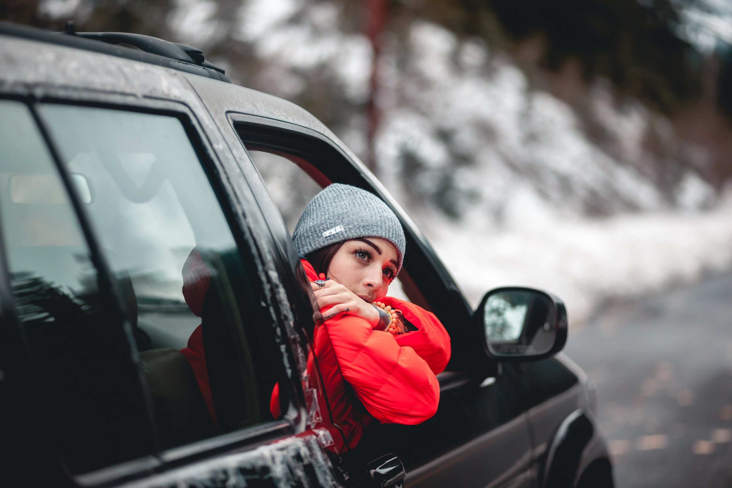 People 2500x1667 women model red jackets hat car car interior brunette woolly hat looking into the distance depth of field road snow women with cars bokeh