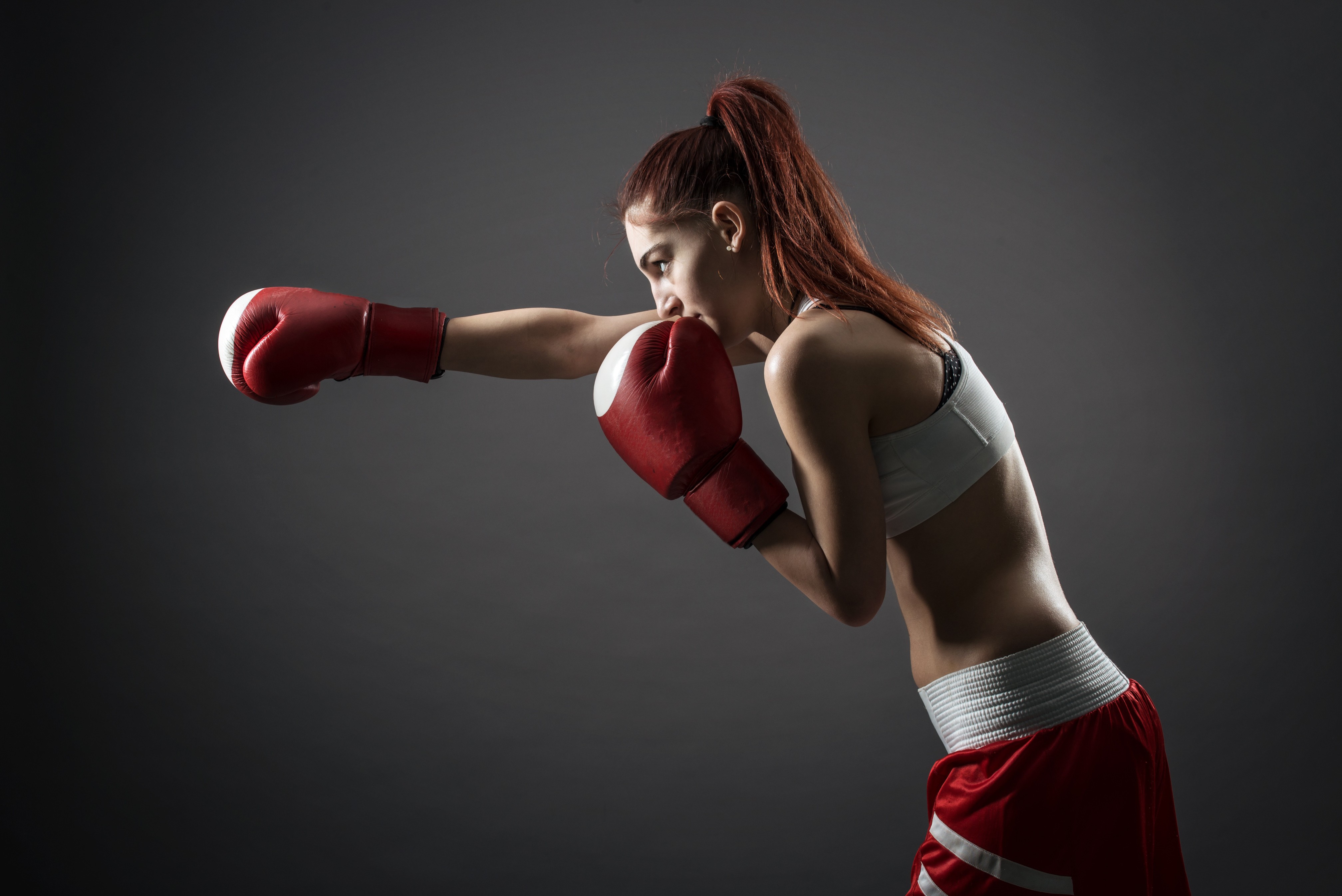 People 4031x2691 boxing women model ponytail boxing gloves slim body redhead dyed hair simple background