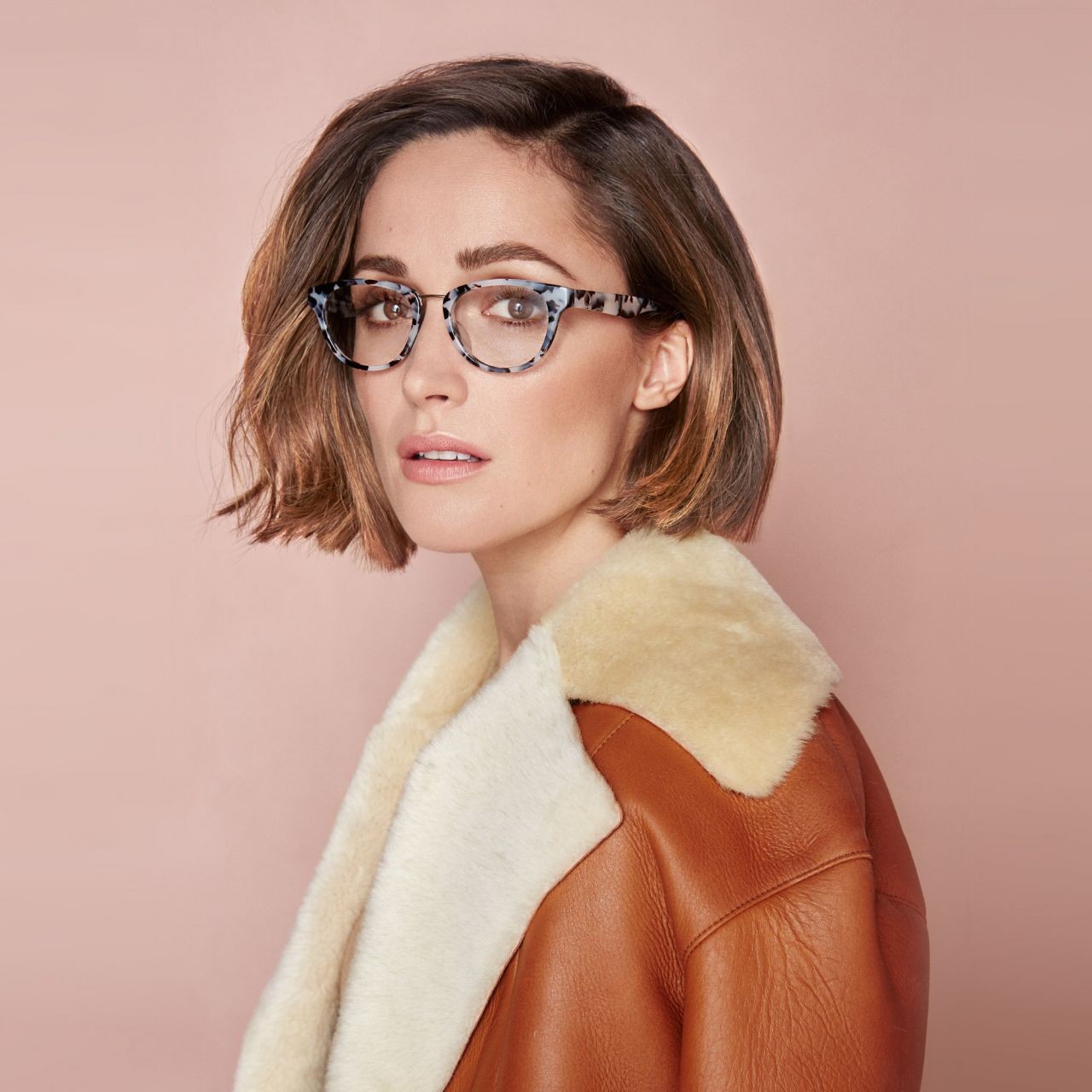People 1280x1280 Rose Byrne actress brunette brown eyes glasses pink lipstick leather jacket Australian women with glasses pink background looking at viewer women women indoors studio