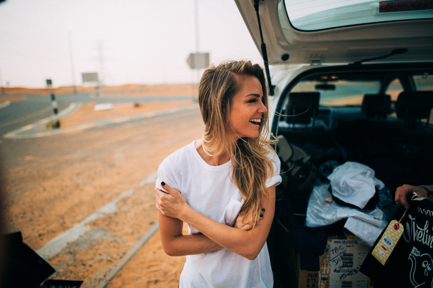 People 1500x1000 women blonde smiling black nails Andre Josselin laughing arms crossed long hair women with cars depth of field T-shirt white tops short sleeves