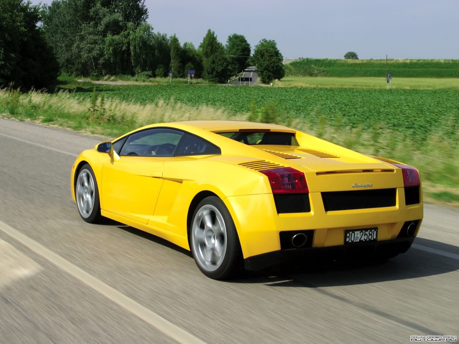 General 1600x1200 car yellow cars numbers Lamborghini vehicle asphalt Lamborghini Gallardo italian cars Volkswagen Group