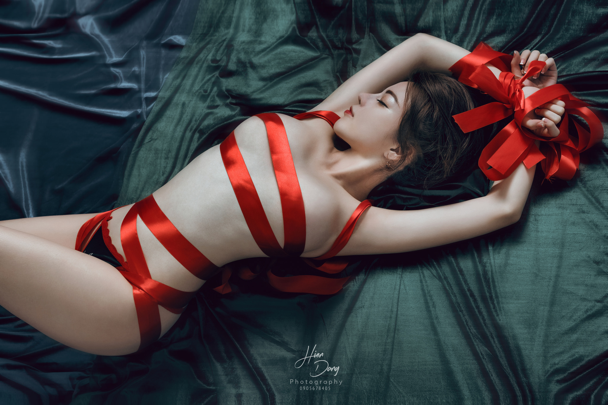 People 2048x1365 lying on back lying down Asian BDSM strategic covering in bed closed eyes Hien Dang Chinese women brunette model makeup red lipstick arms up armpits wrapped ribbon red ribbon topless naked ribbon covered nipples arms tied