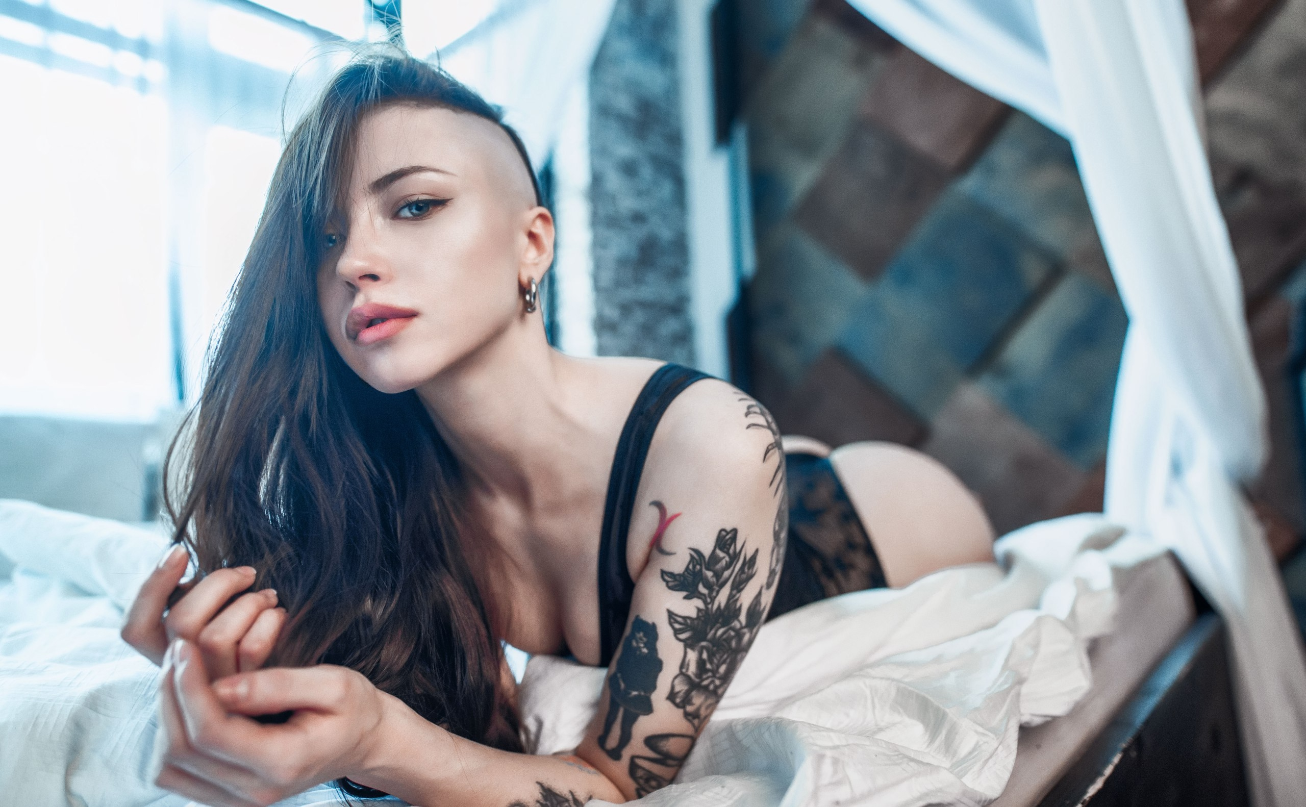 People 2560x1582 women tattoo black lingerie ass in bed eyeliner lying on front depth of field blue eyes undercut (hairstyle)