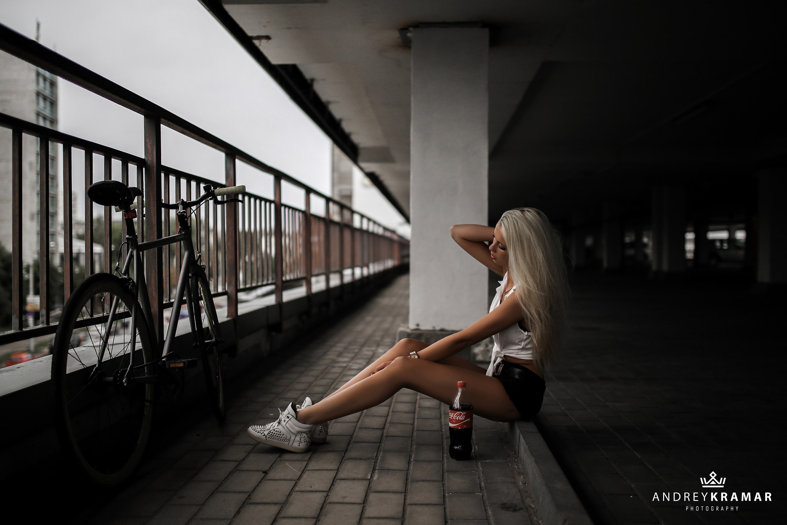 People 2560x1707 women model blonde sneakers jean shorts bottles Coca-Cola hands on head T-shirt Andrey Kramar long hair women with bicycles urban women outdoors vehicle dyed hair sitting white shoes watermarked looking away slim body bicycle