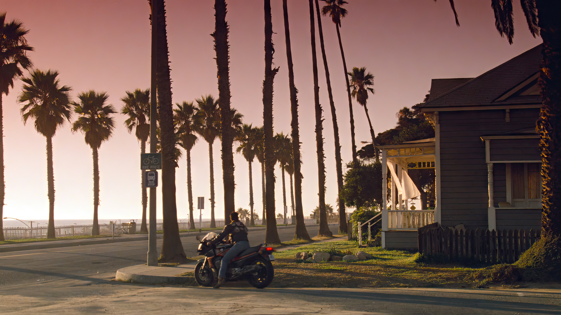 General 1920x1080 Top Gun  movies film stills Tom Cruise actor motorcycle palm trees street house road sign sky sunset sunset glow vehicle road