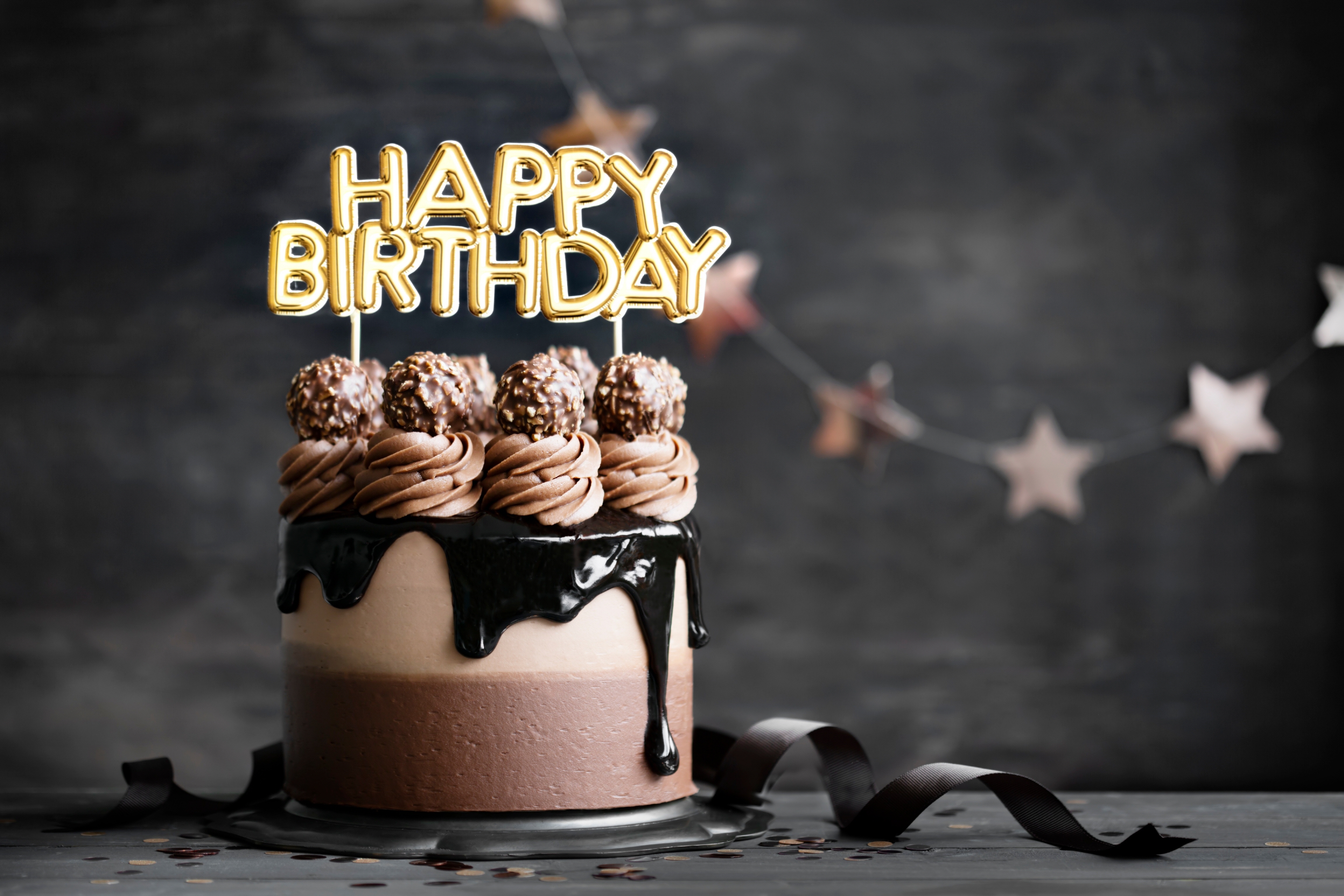 General 4608x3072 cake birthday celebrations happy candles chocolate sweets depth of field stars blurry background