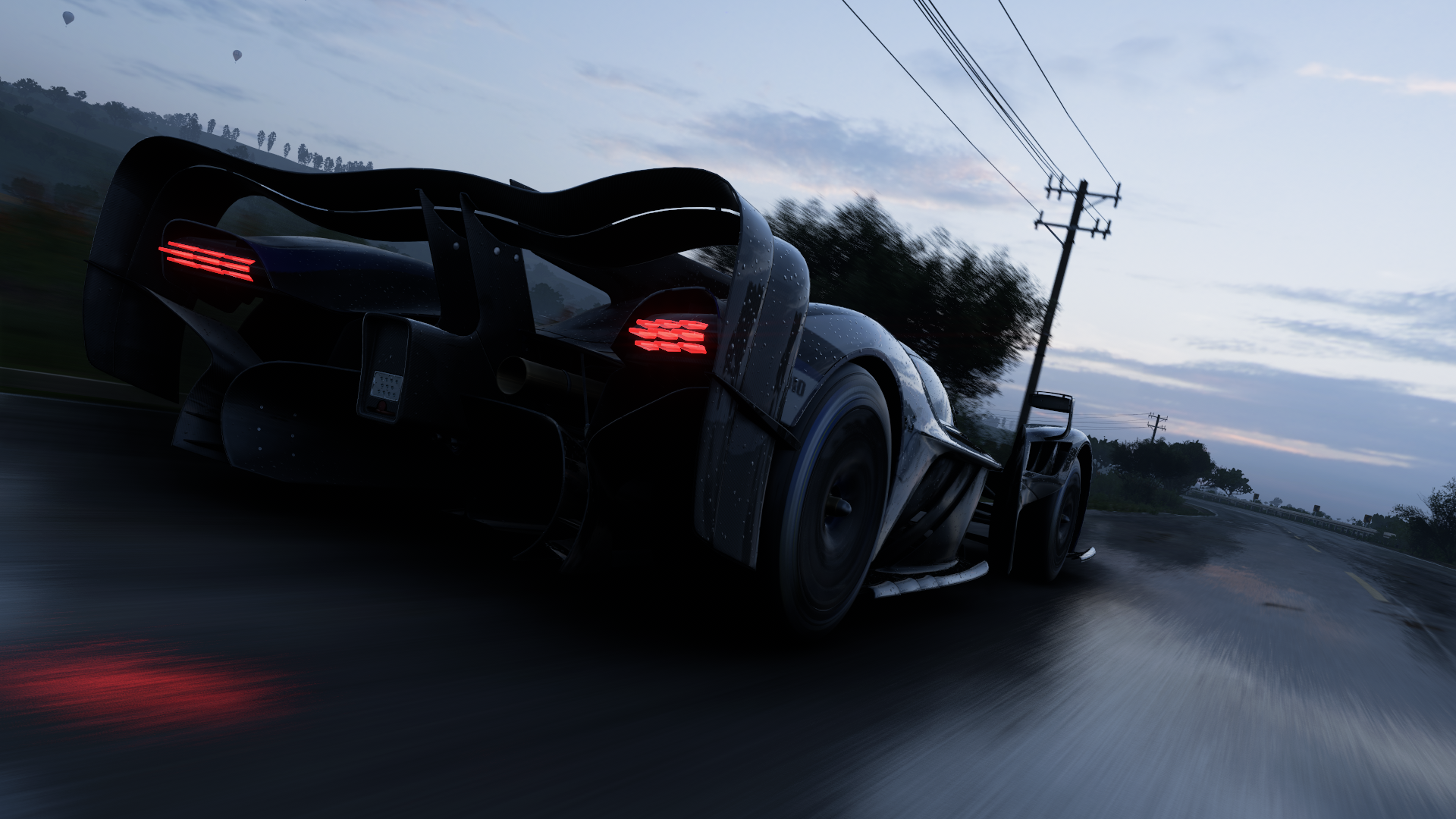 General 1920x1080 Forza Horizon 5 car screen shot Aston Martin aston martin valkyrie Hypercar British cars PlaygroundGames sky video game art clouds video games rear view taillights motion blur blurred power lines road CGI vehicle
