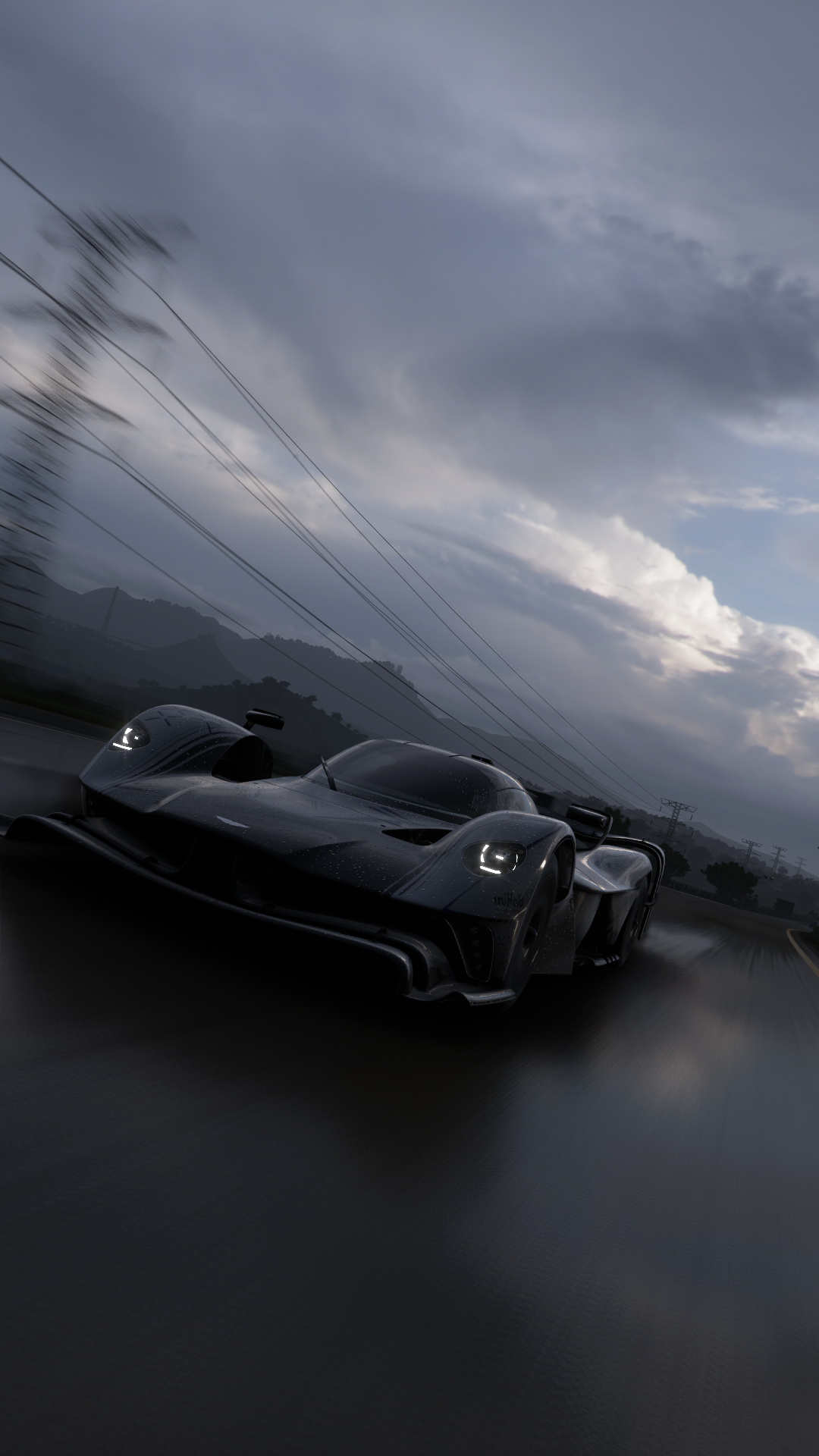 General 1080x1920 Forza Forza Horizon 5 Aston Martin AM RB 003 Hypercar British cars Turn 10 Studios V6 engine Xbox Game Studios vehicle car PlaygroundGames Aston Martin screen shot video game art clouds video games headlights frontal view motion blur blurred overcast sky power lines portrait display driving
