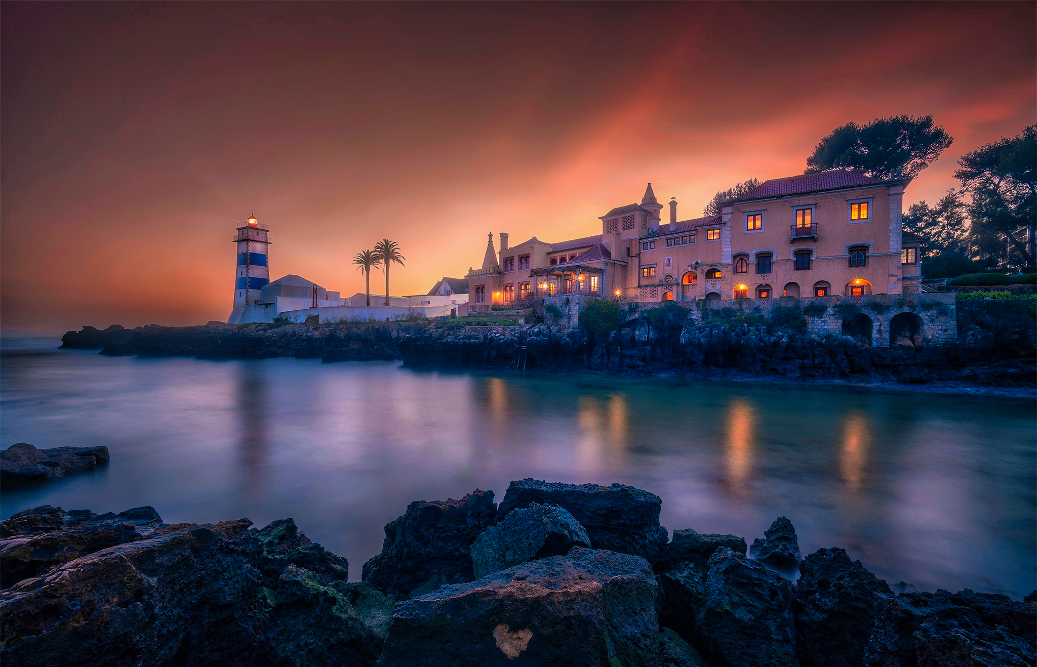 General 2048x1318 water lighthouse building sunset sunset glow night rocks palm trees photography outdoors