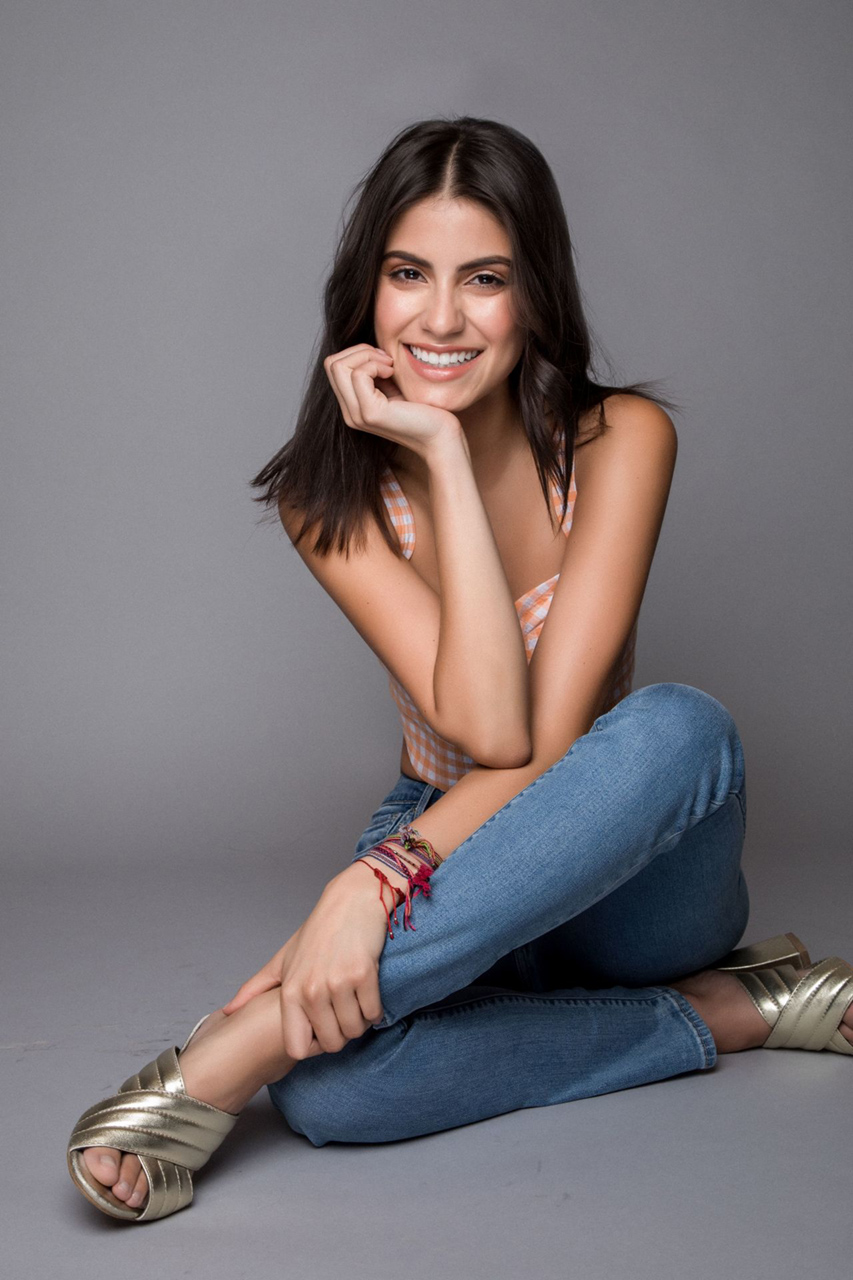 People 853x1280 Barbara Lopez women actress brunette dark hair Mexican smiling simple background jeans on the floor