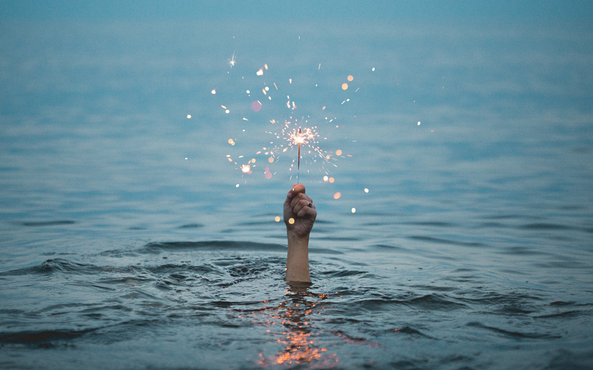 General 1920x1200 sea water hands fire photography sparkler Kristopher Roller