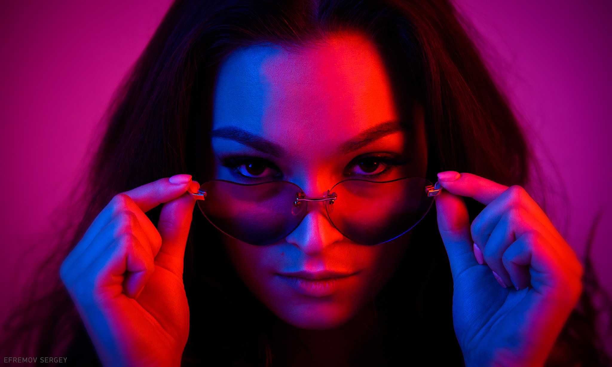 People 2048x1228 women face portrait women with glasses neon Sergey Efremov touching glasses red purple watermarked low light closeup