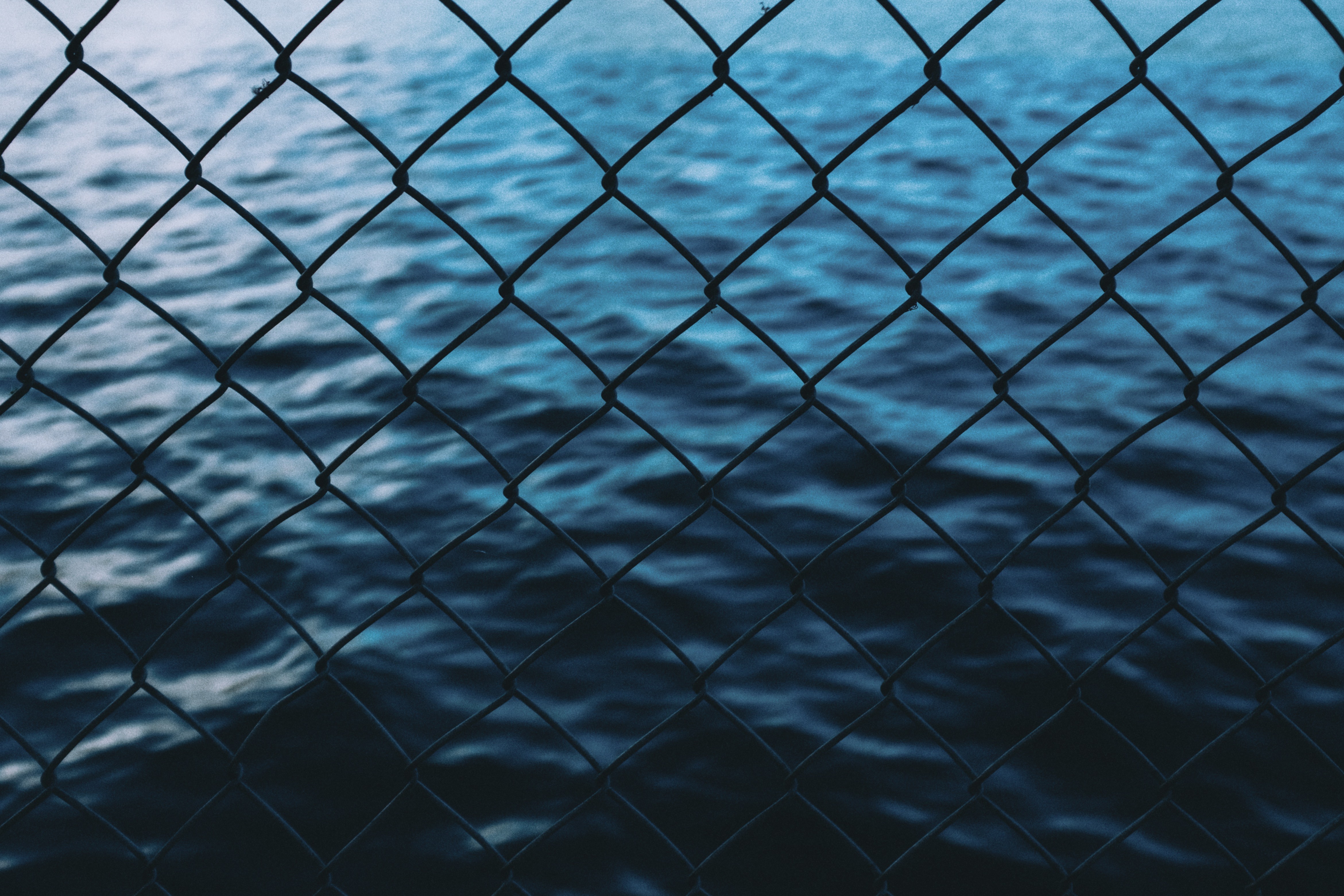 General 4682x3122 sea waves grid fence metal grid water outdoors dark closeup