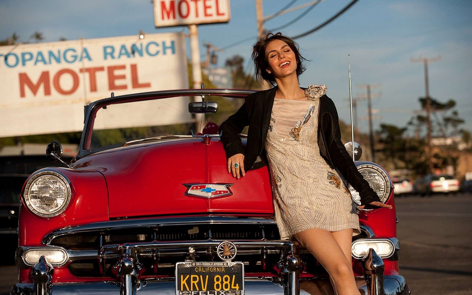 People 1920x1200 car women with cars numbers vehicle oldtimers red cars smiling happy women model women outdoors USA motel dark hair dress California Chevrolet American cars