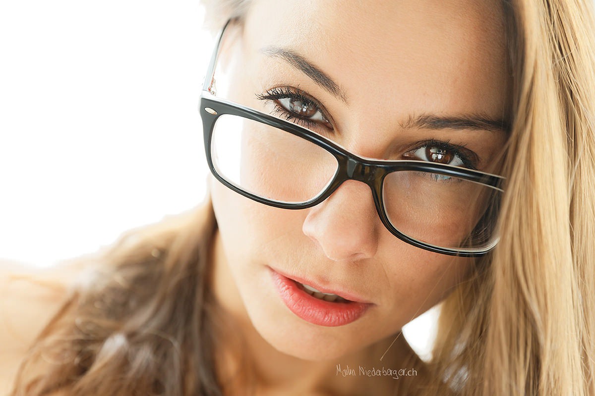 People 1200x800 women model blonde face portrait women with glasses closeup looking at viewer simple background white background brown eyes Martin Niederberger watermarked