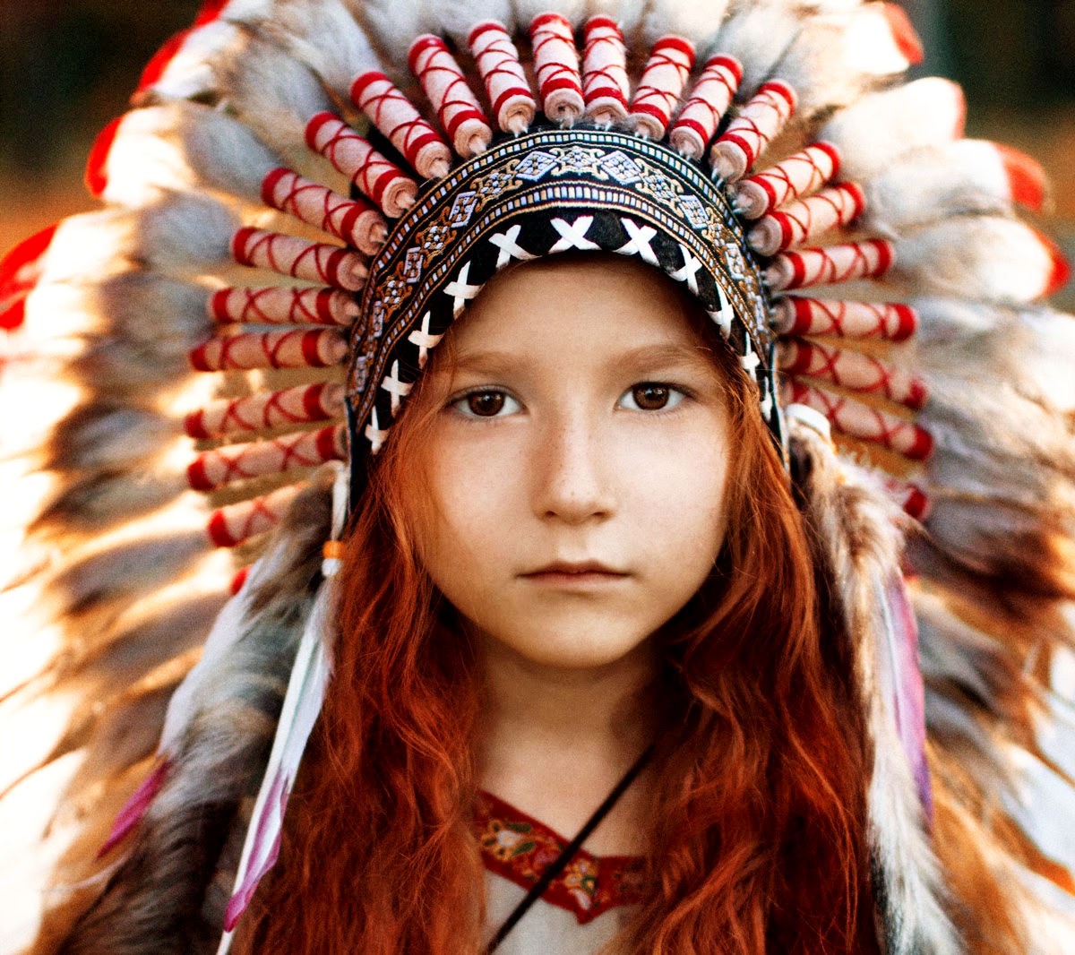 People 1200x1066 children redhead headdress Native American clothing closeup