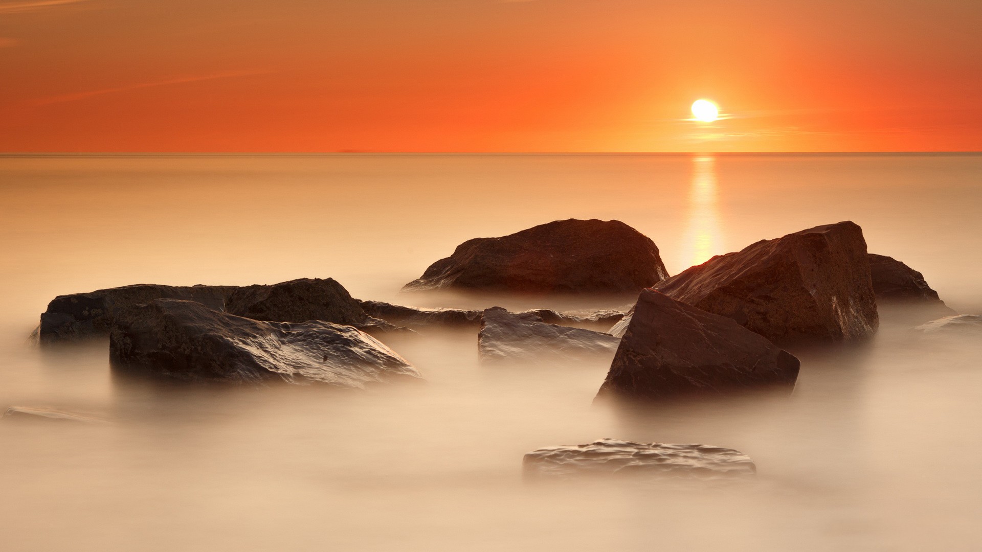 General 1920x1080 sea Sun nature sky orange sky sunlight horizon outdoors rocks stones calm waters