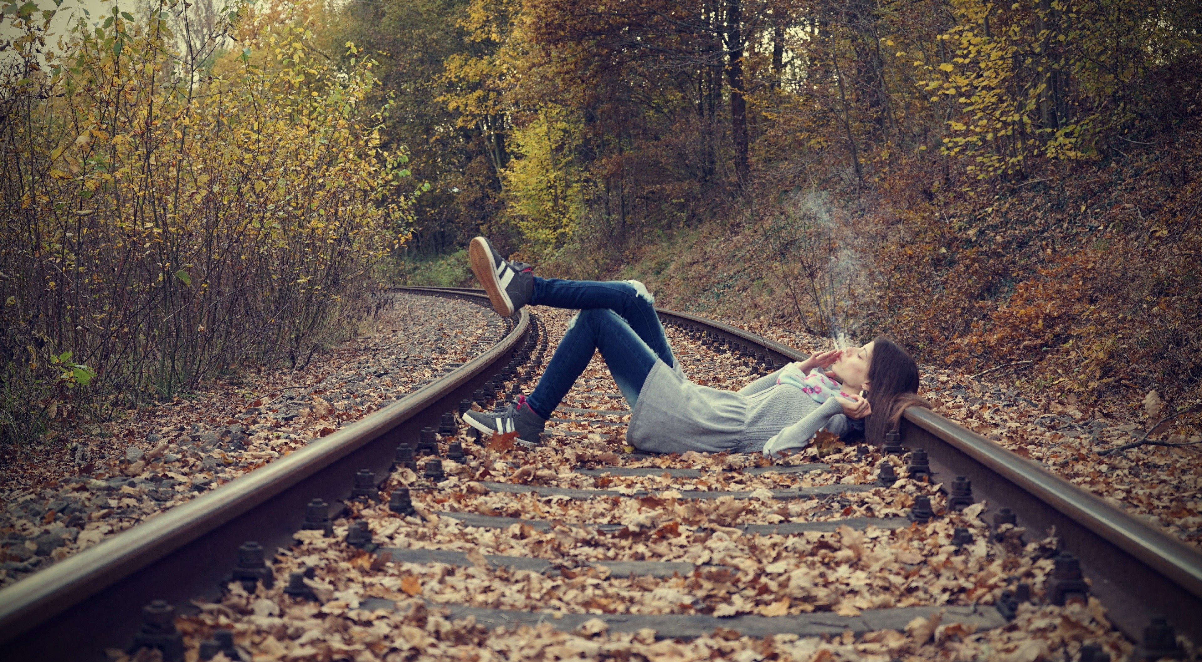 People 3840x2116 women lying down railway brunette smoking women outdoors leg up fallen leaves fall