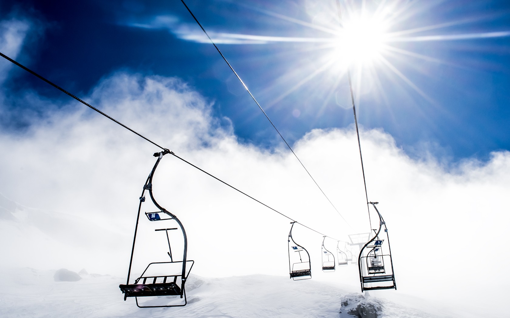 General 1680x1050 ski lifts sunlight clouds winter Sun sky outdoors