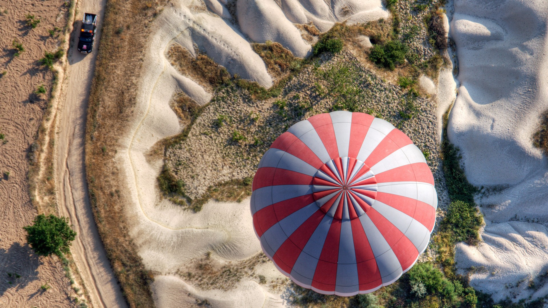 General 1920x1080 hot air balloons landscape aerial view desert dirt road vehicle car digital art