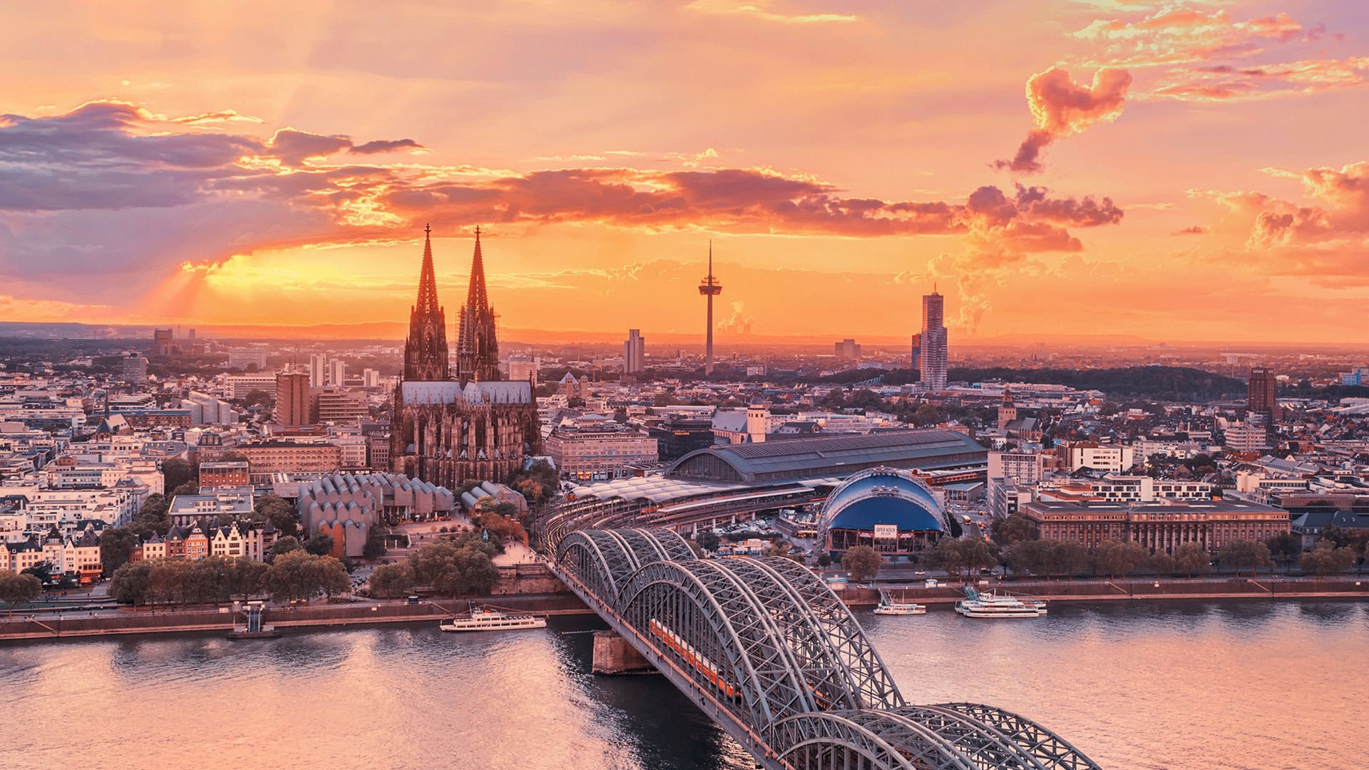 General 1920x1080 Germany cityscape sunset city Cologne bridge Cologne Cathedral orange sky