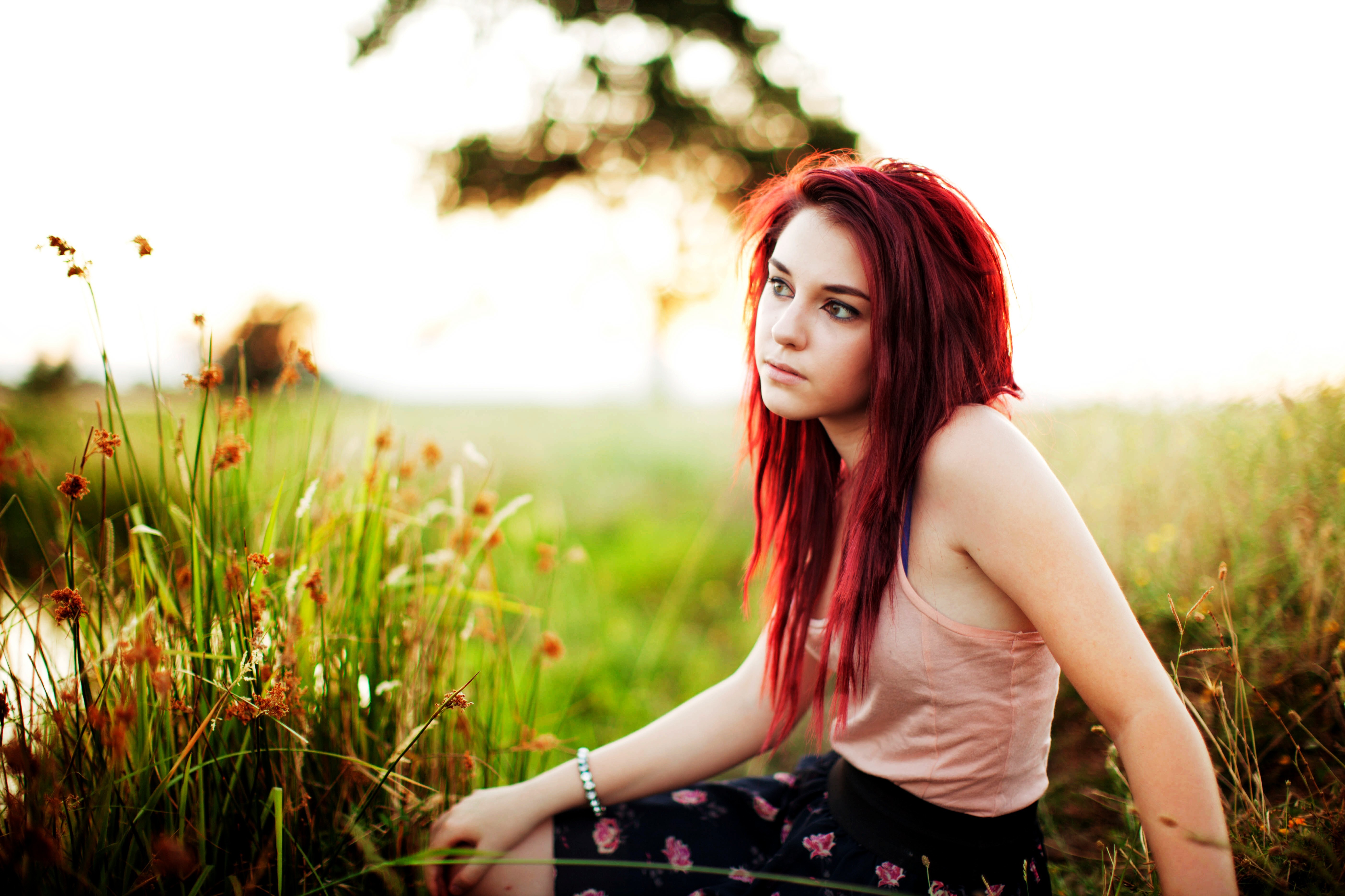 People 5616x3744 face women redhead grass Tosha McCarter women outdoors bokeh outdoors flowers plants looking into the distance dyed hair model sitting