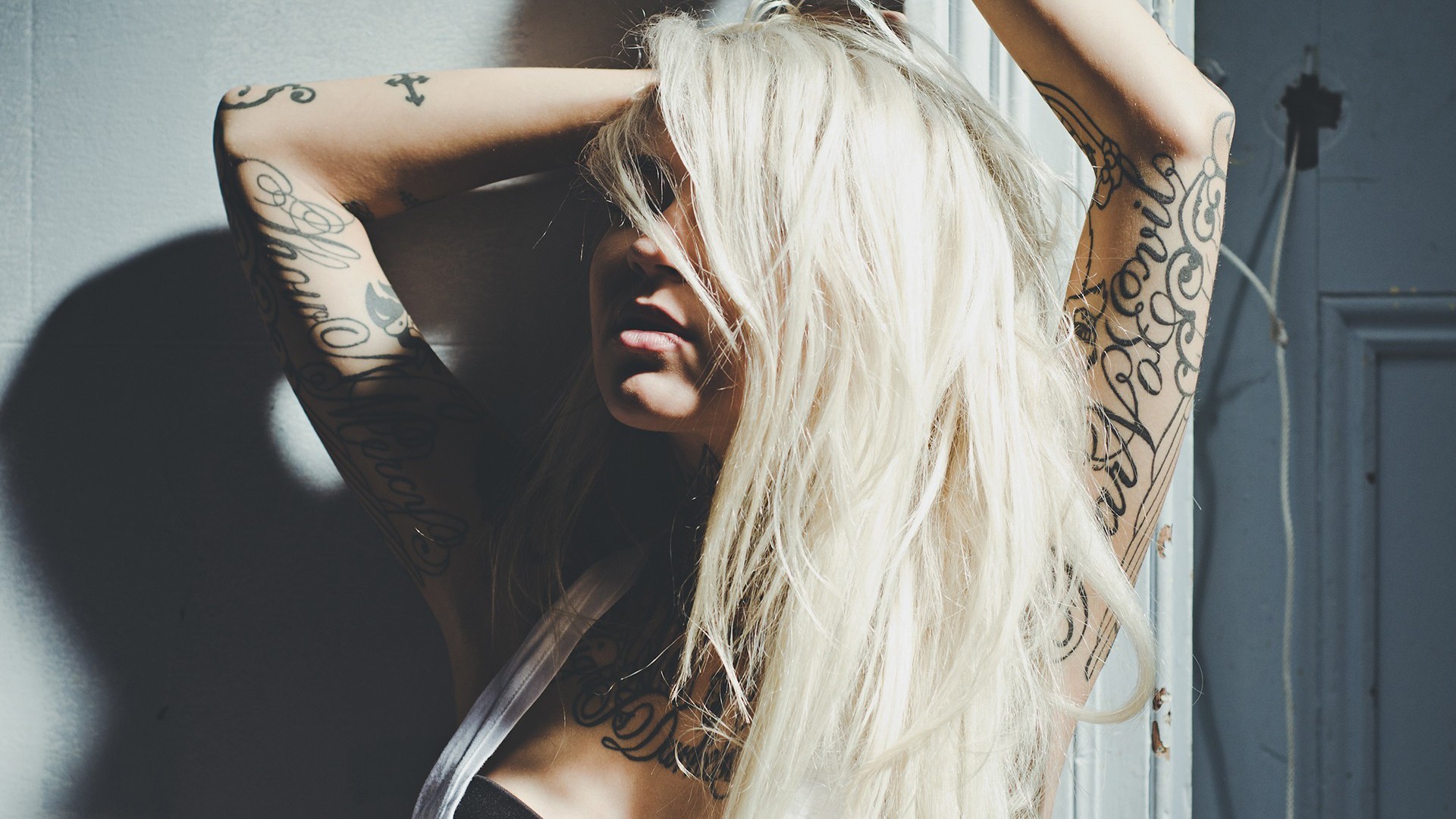 People 1920x1080 Sara Fabel blonde tattoo women model inked girls arms up face hair over one eye women indoors indoors