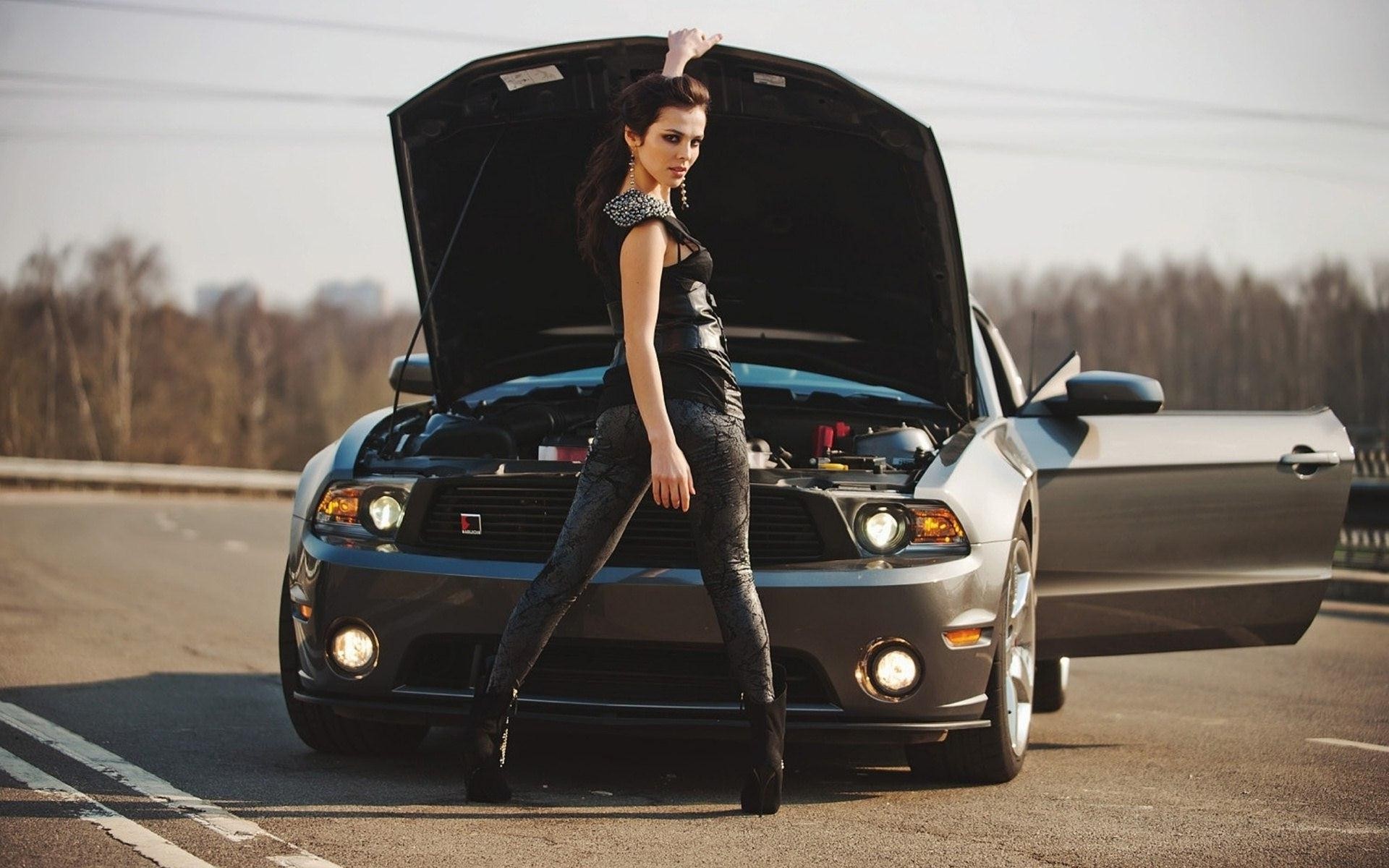 People 1920x1200 Sati Kazanova car women brunette looking back tight clothing women with cars leather pants  legs women outdoors outdoors looking at viewer vehicle smoky eyes Russian women Ford Ford Mustang muscle cars American cars hood (car)