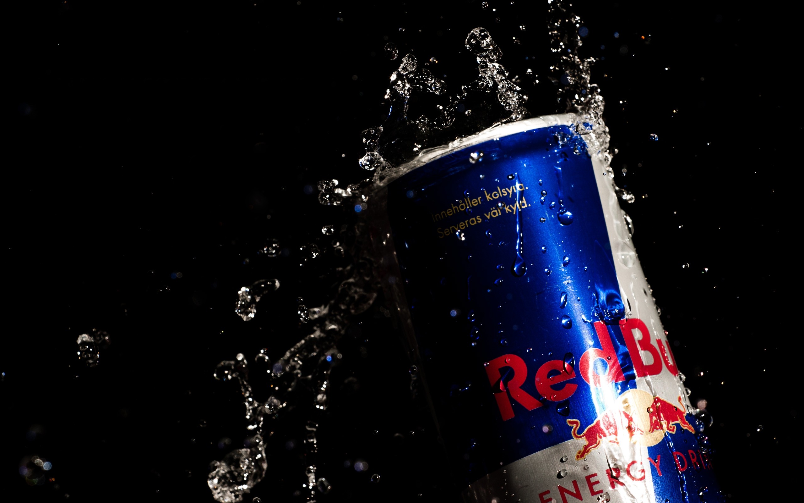 General 2560x1600 brand Red Bull can energy drinks closeup low light